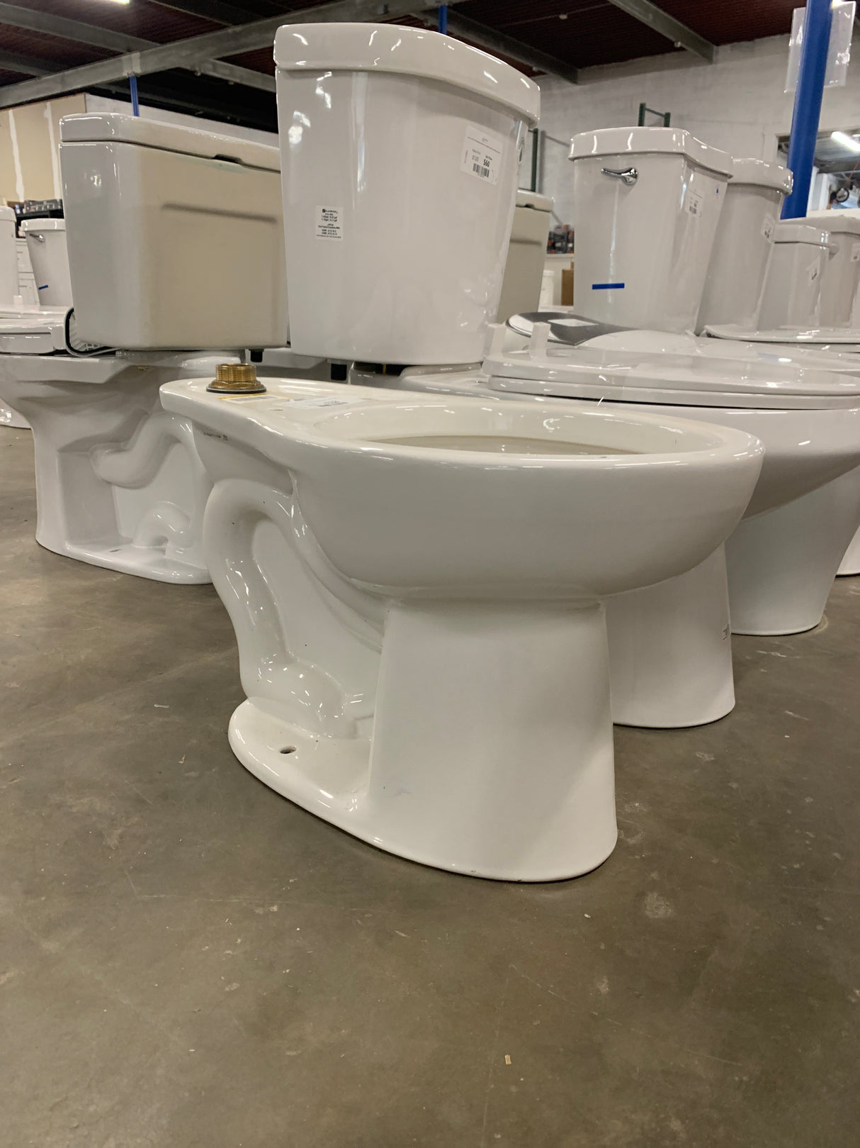 Madera 1-Piece 1.28 GPF Single Flush Elongated Toilet in White