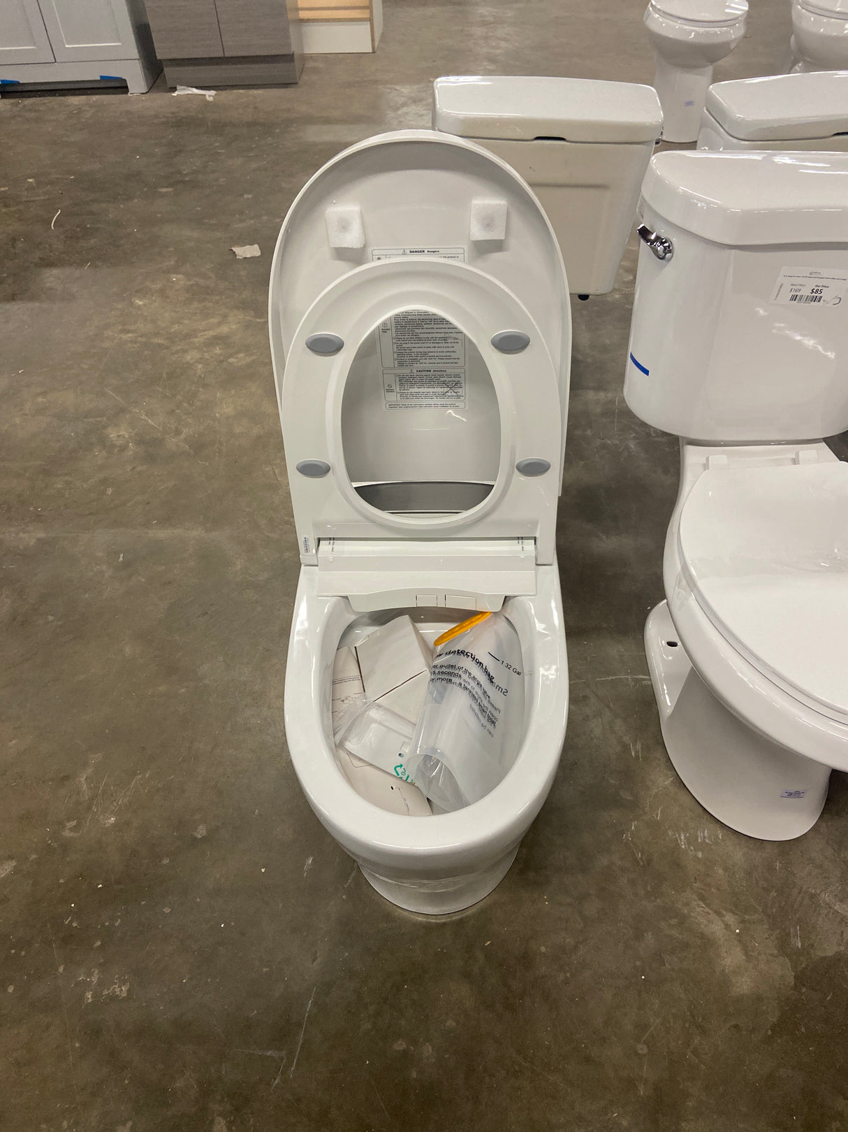 Tankless Elongated Smart Toilet Bidet in White with Auto Flush, Heated Seat, Warm Air Dryer, Bubble Infusion Wash
