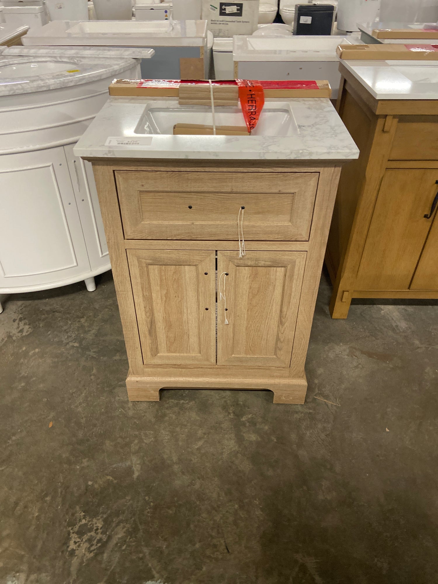 Doveton 24 in. W x 19 in. D x 34.5 in. H Single Sink Bath Vanity in Weathered Tan with White Engineered Marble Top