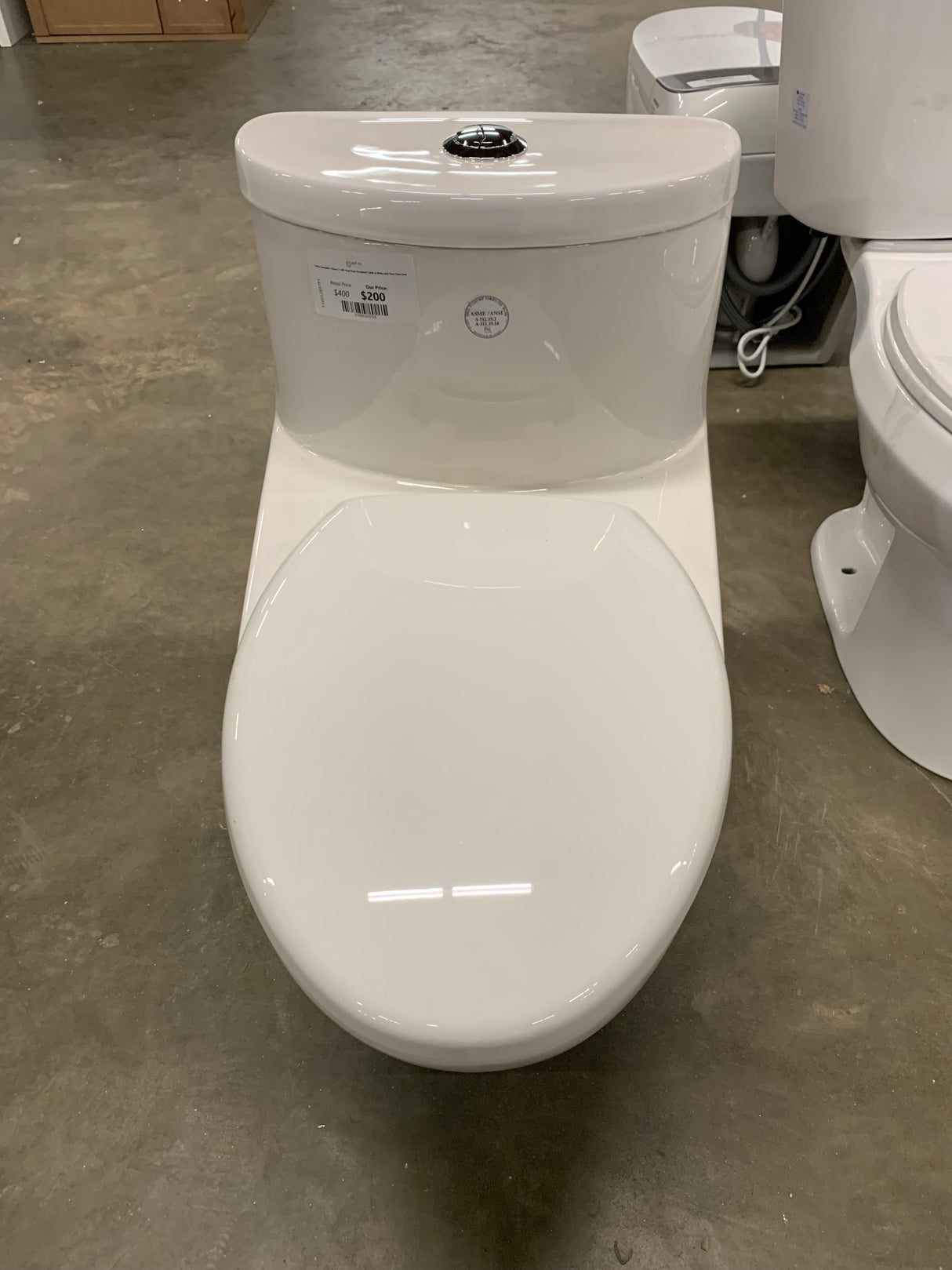 Tofino Complete 1-Piece 1.1 GPF Dual Flush Elongated Toilet in White with Slow Close Seat