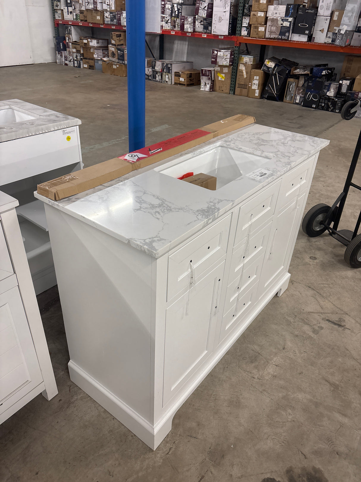 Doveton 48 in. W x 19 in. D x 34 in. H Single Sink Bath Vanity in White with White Engineered Marble Top