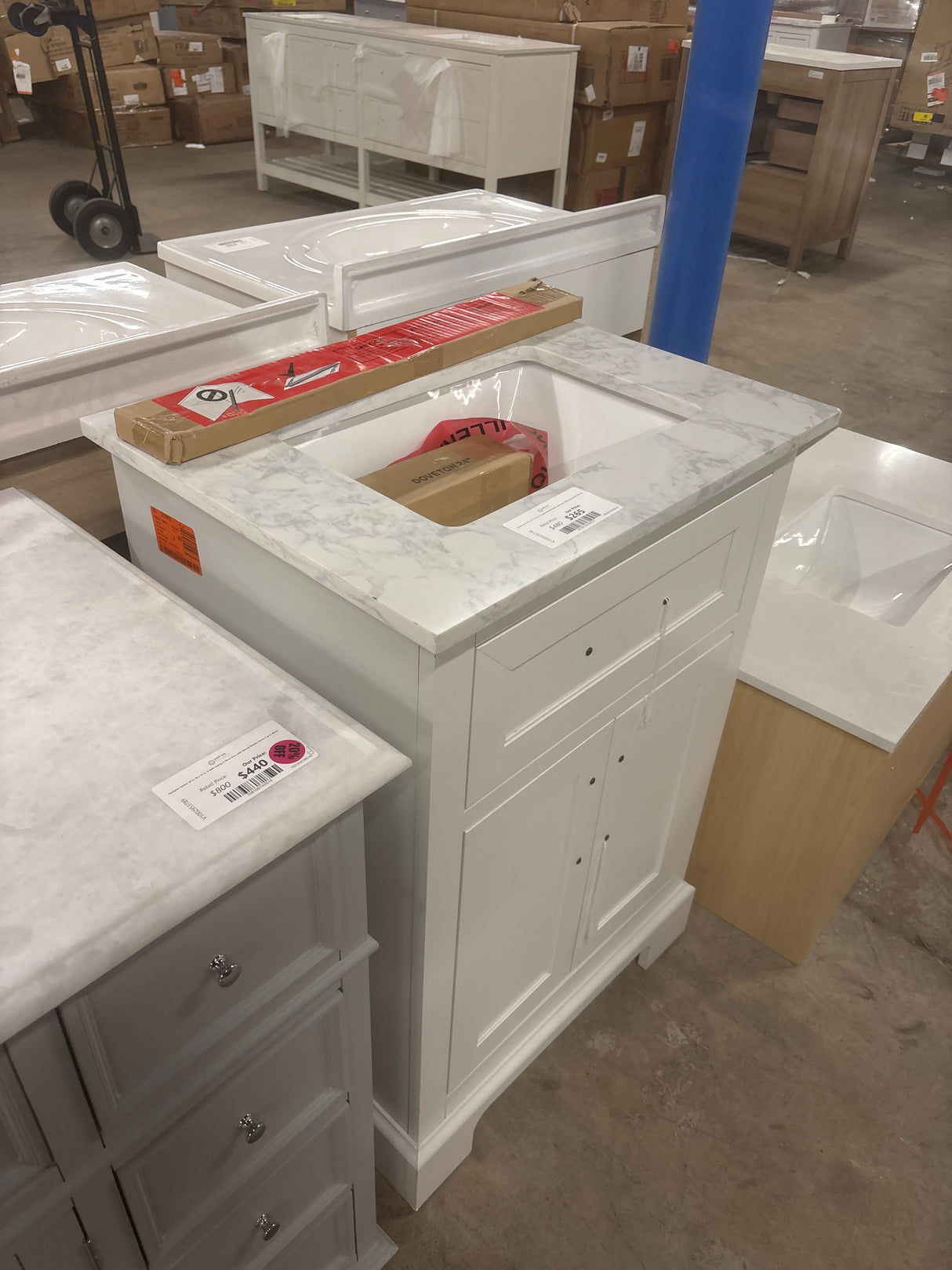 Doveton 24 in. W x 19 in. D x 34 in. H Single Sink Bath Vanity in White with White Engineered Marble Top