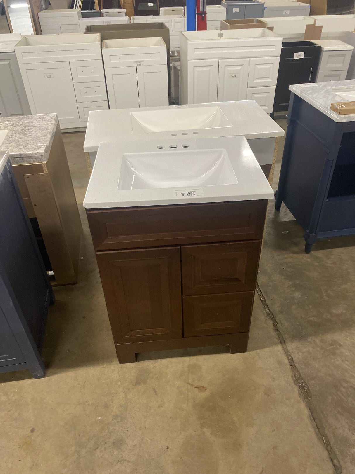 Sedgewood 24.5 in. W x 18.75 in. D x 34.375 in. H Single Sink Bath Vanity in Dark Cognac with Arctic Solid Surface Top