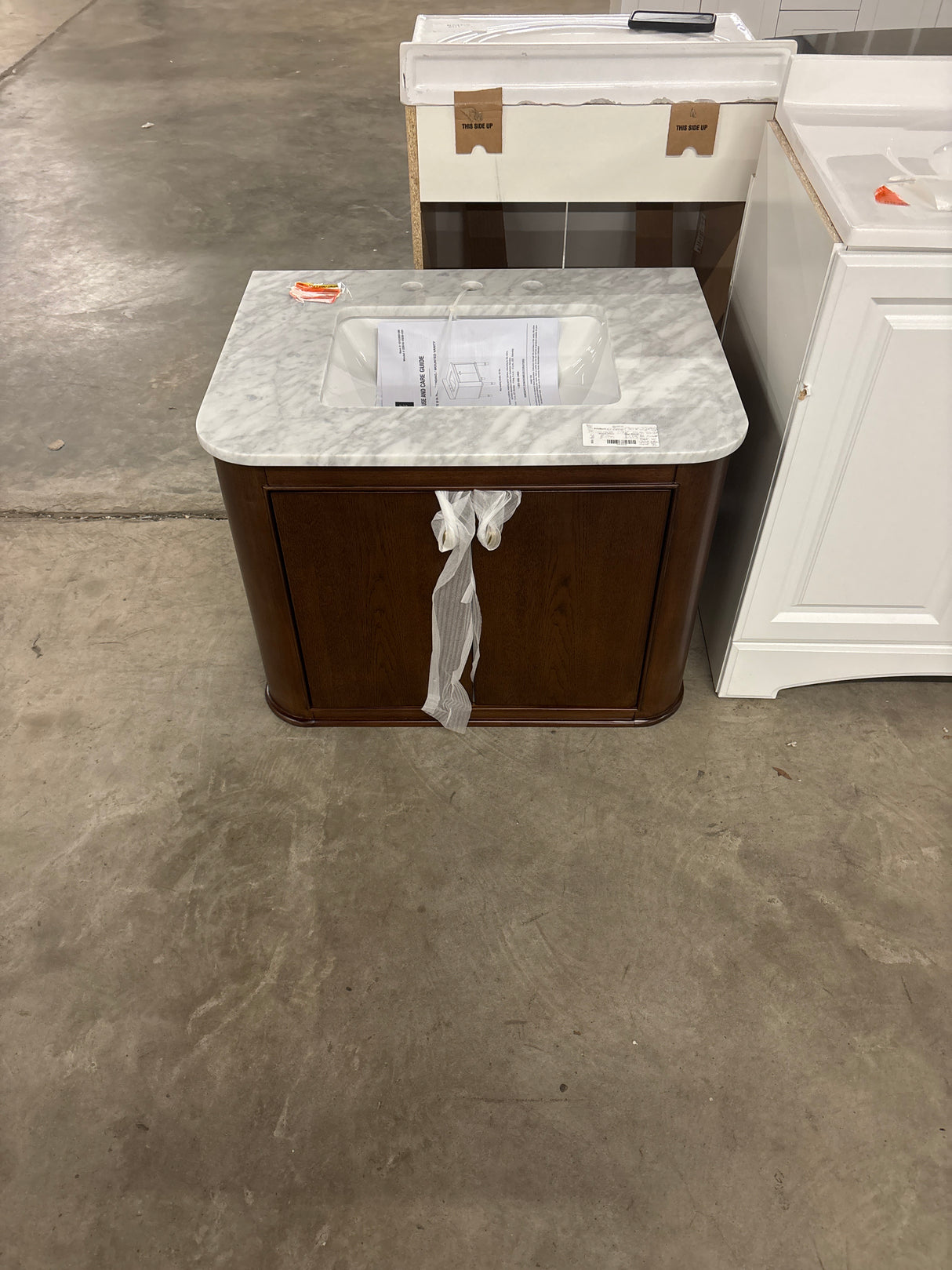 Collette 30 in W x 22 in D x 35 in H Single Sink Bath Vanity in Cinnamon Oak With White Carrara Marble Top