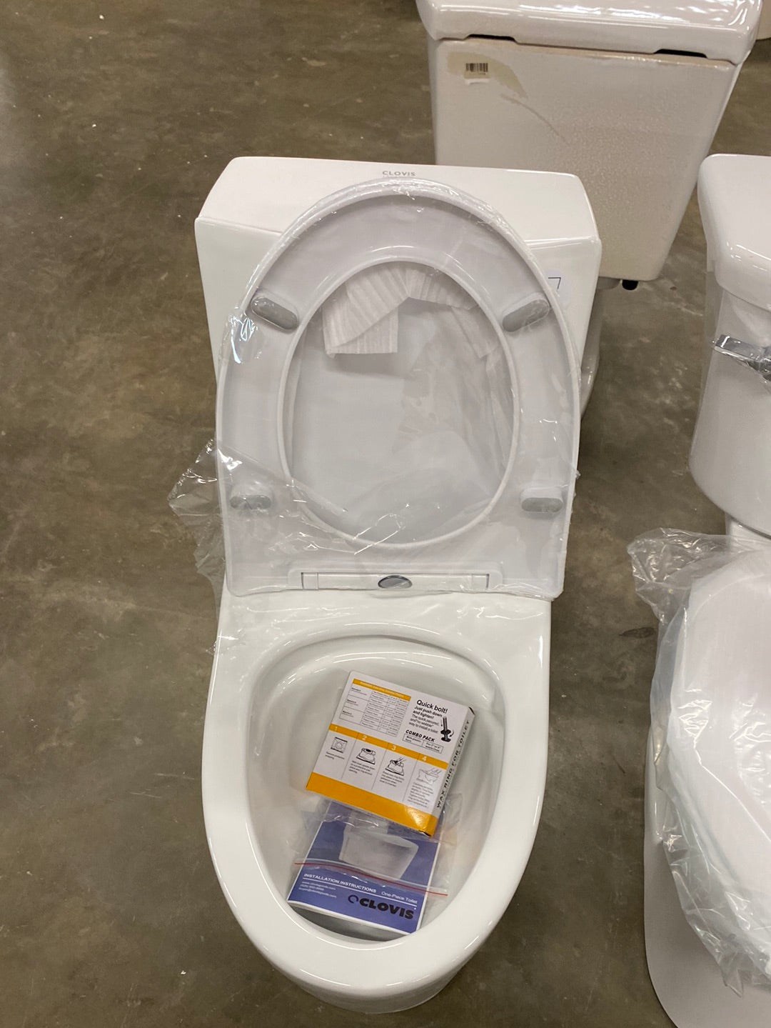 Ultraluxe 12 in. Rough-In 1-piece 1/1.6 GPF Dual Flush Elongated Toilet in White, Seat Included