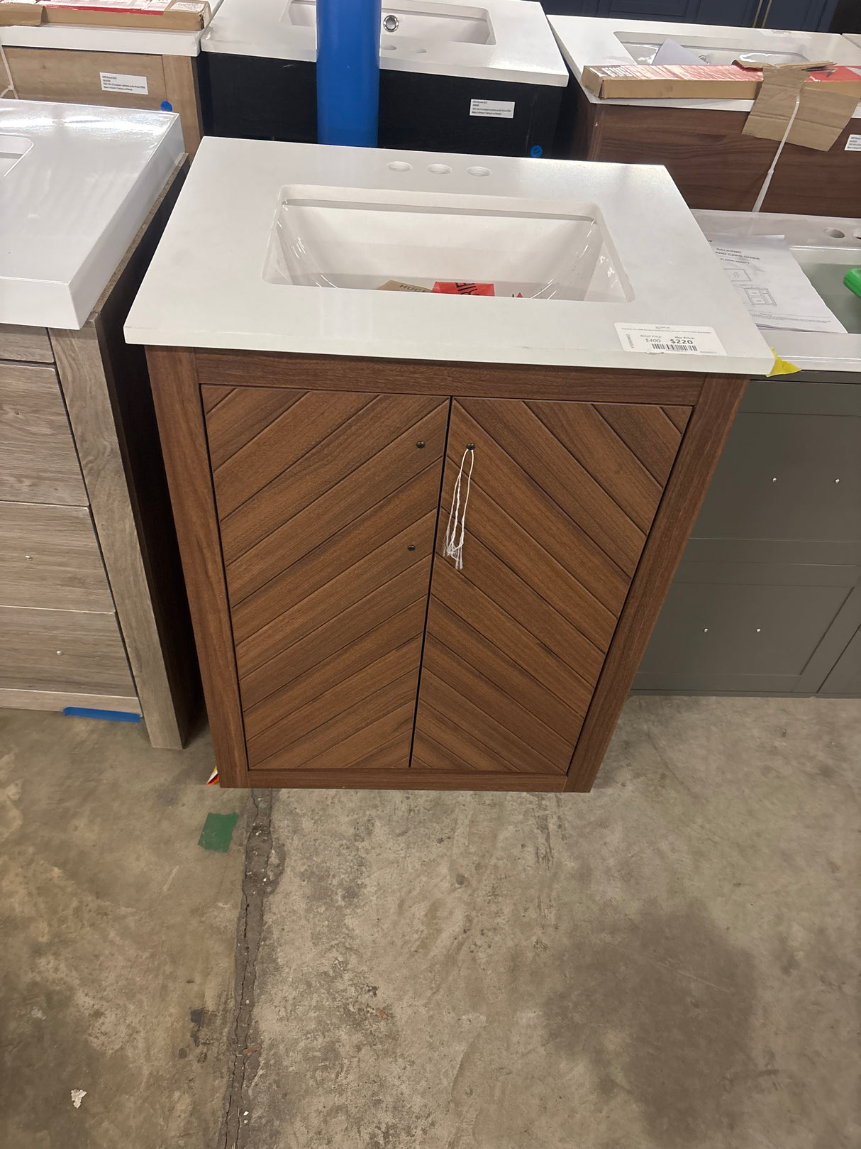 Huckleberry 24 in. Single Sink Spiced Walnut Bath Vanity with White Engineered Stone Top (Assembled)