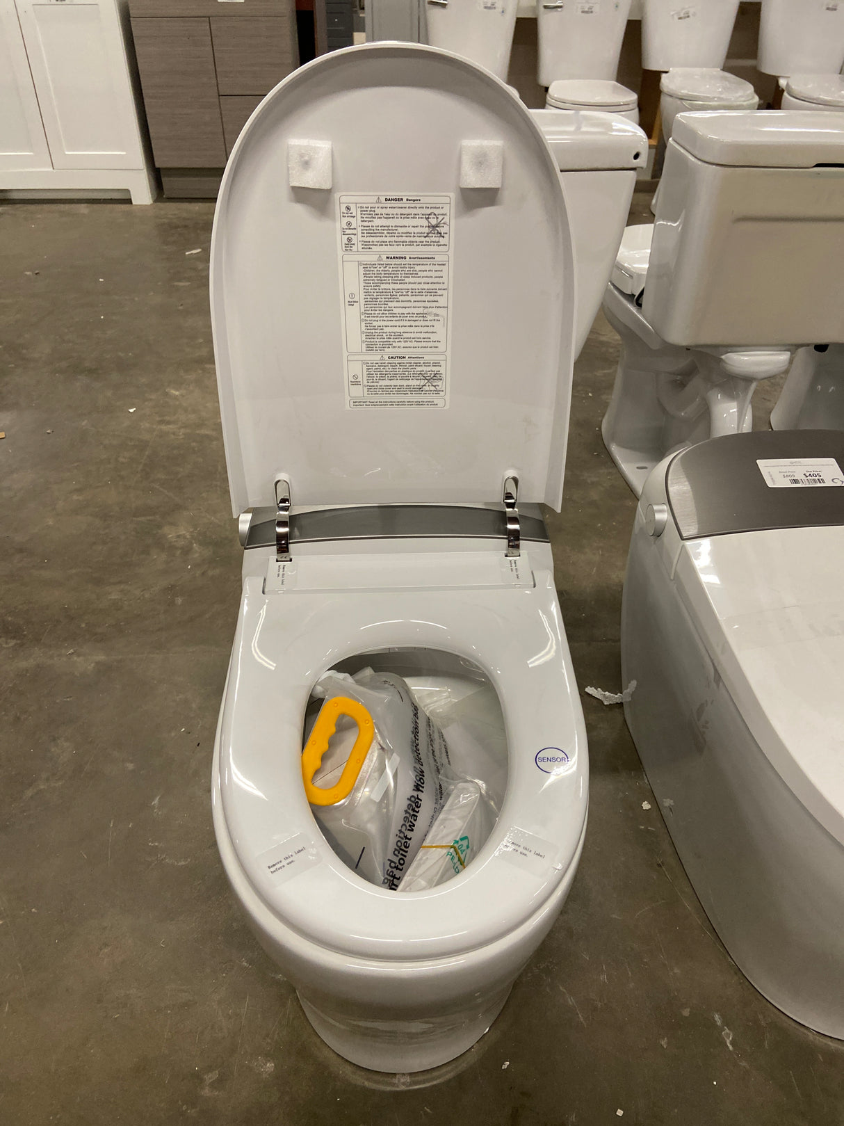 Tankless Elongated Smart Toilet Bidet in White with Auto Flush, Heated Seat, Warm Air Dryer, Bubble Infusion Wash