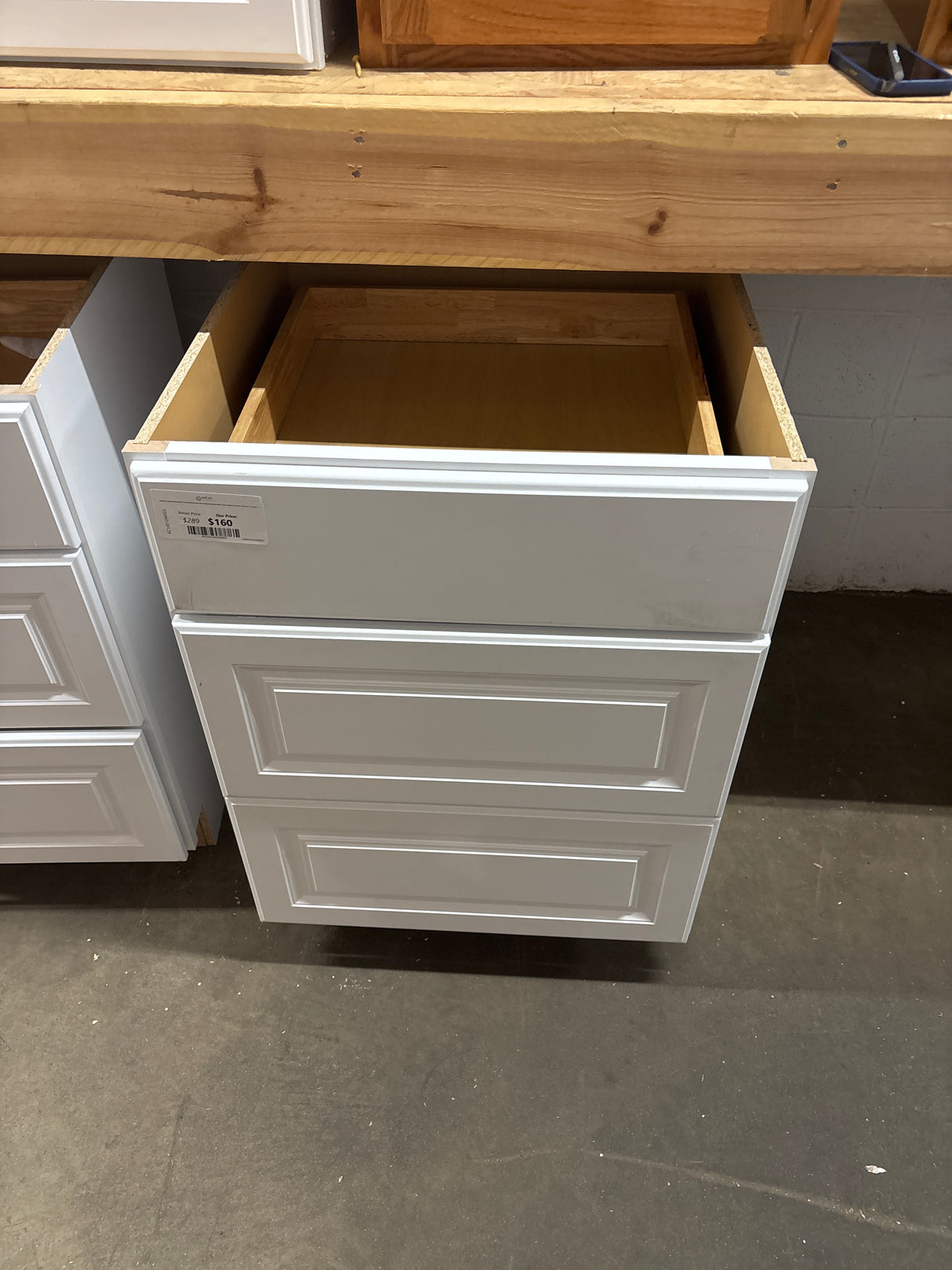 Hampton Satin White Raised Panel Stock Drawer Base Kitchen Cabinet with Drawer Glides (24 in.W x 34.5 in.H x 24 in.D)