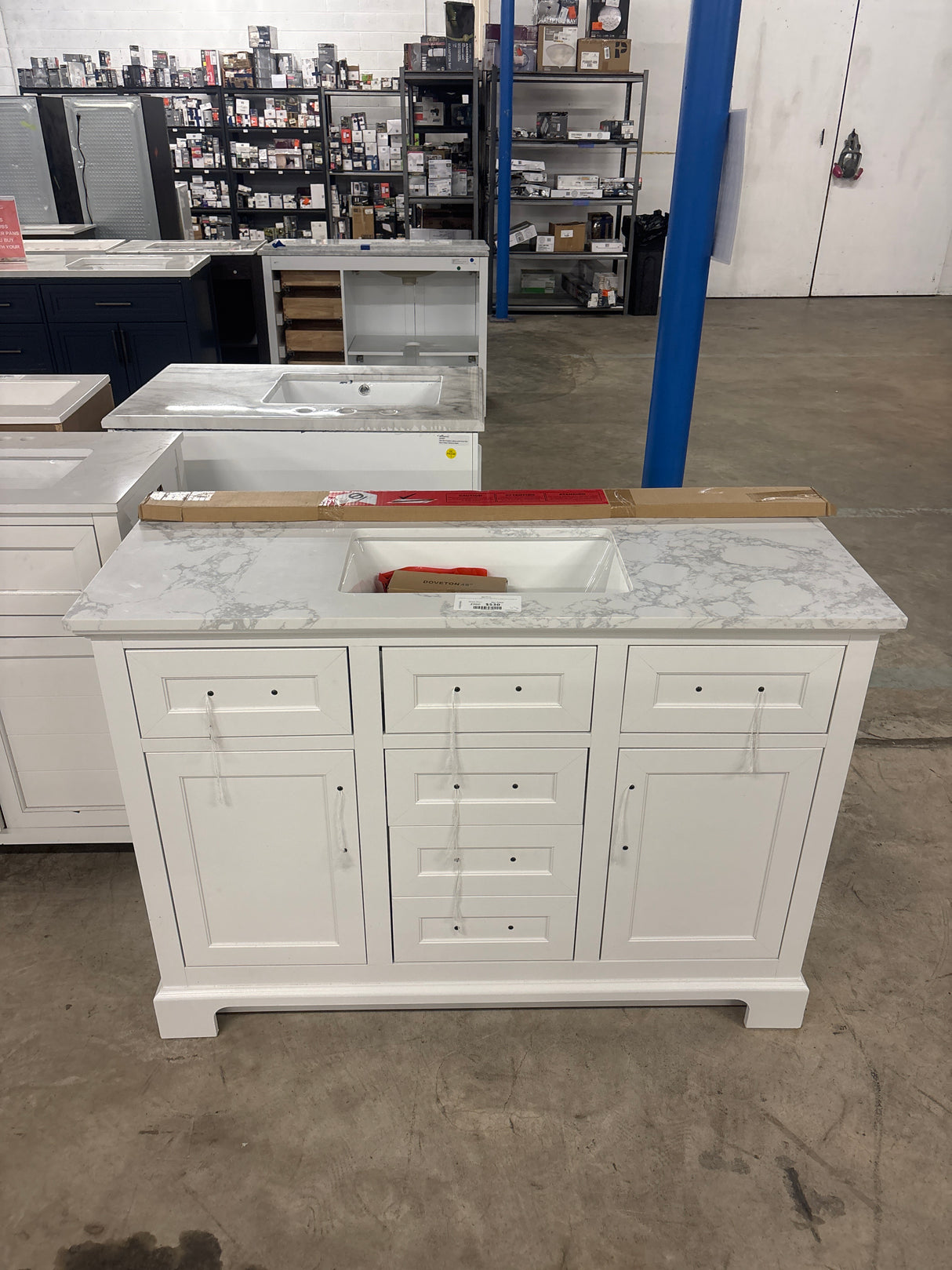 Doveton 48 in. W x 19 in. D x 34 in. H Single Sink Bath Vanity in White with White Engineered Marble Top