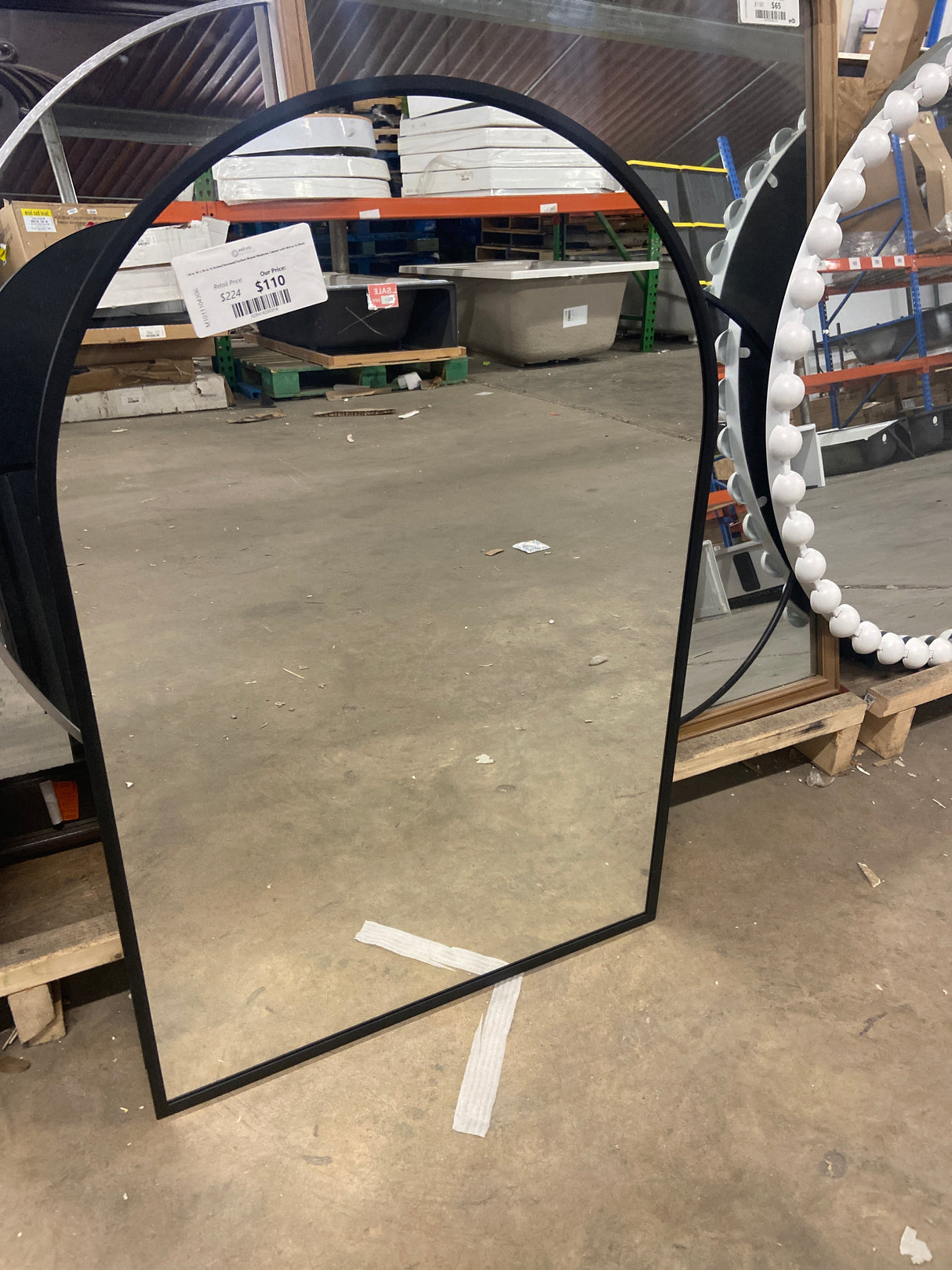 24 in. W x 36 in. H Arched Recessed/Surface Mount Medicine Cabinet with Mirror in Black