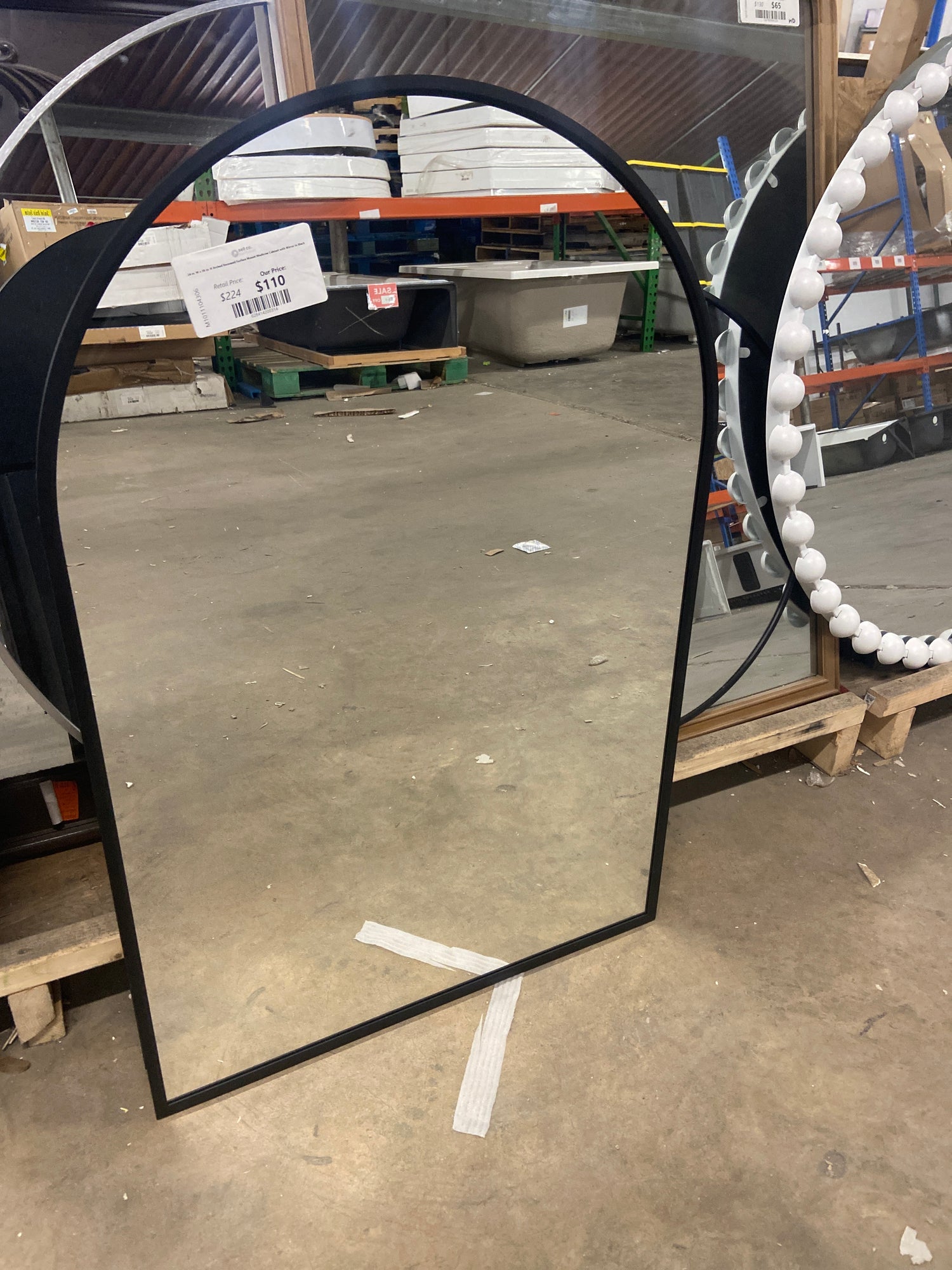 24 in. W x 36 in. H Arched Recessed/Surface Mount Medicine Cabinet with Mirror in Black