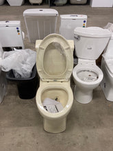 Load image into Gallery viewer, Classe 1-Piece 1.28 GPF Single Flush Elongated Toilet with Front Flush Handle in Bisque Seat Included

