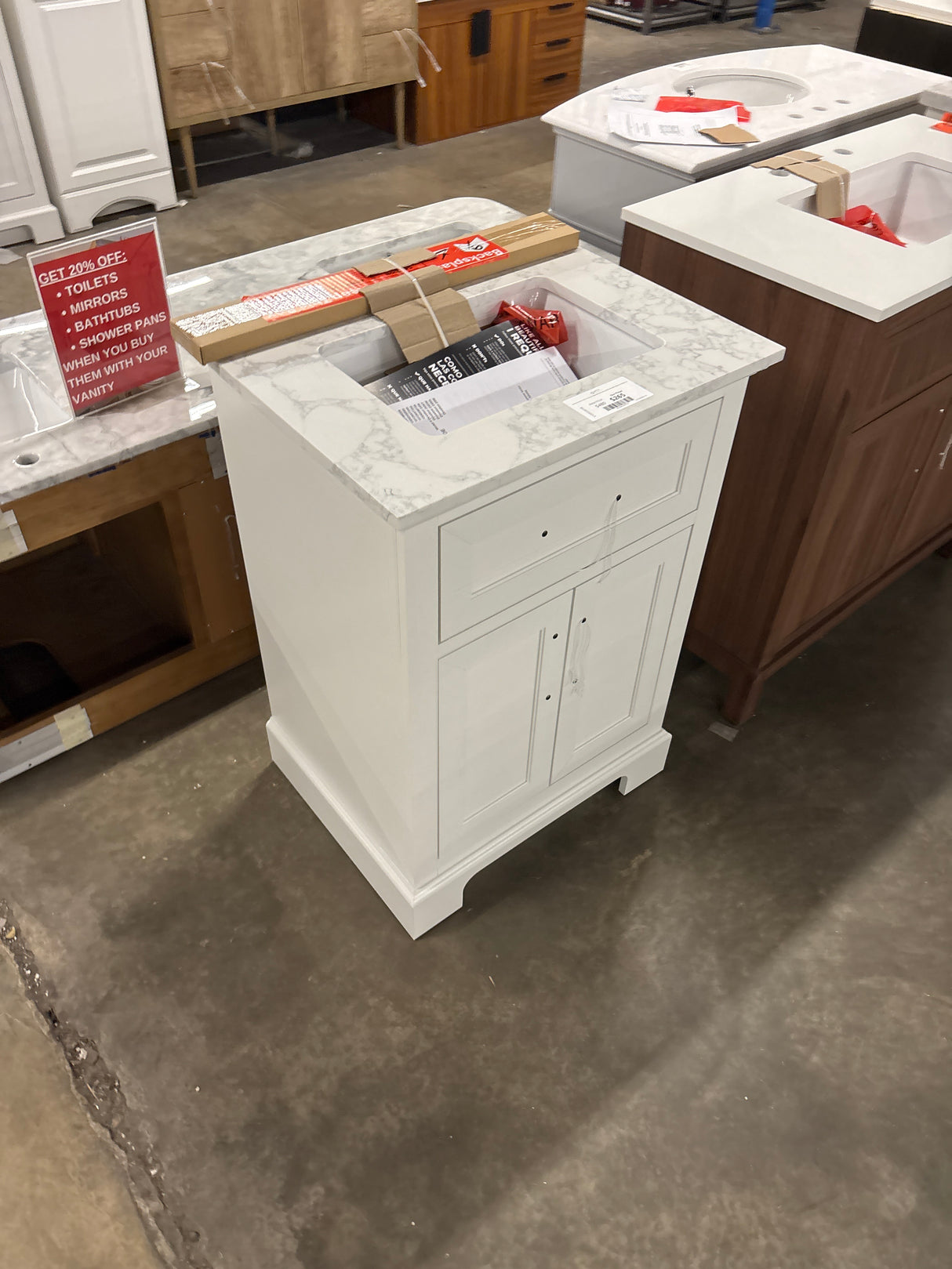 Doveton 24 in. W x 19 in. D x 34 in. H Single Sink Bath Vanity in White with White Engineered Marble Top