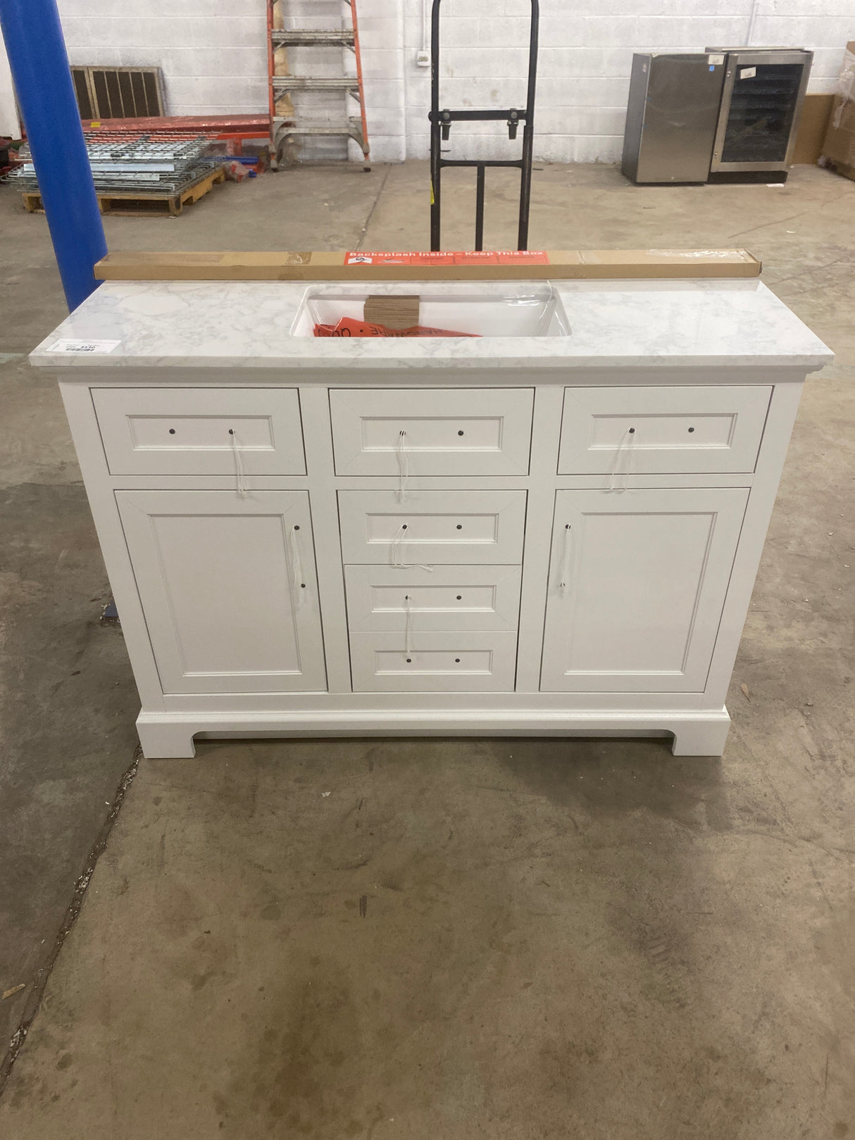 Doveton 48 in. W x 19 in. D x 34 in. H Single Sink Bath Vanity in White with White Engineered Marble Top