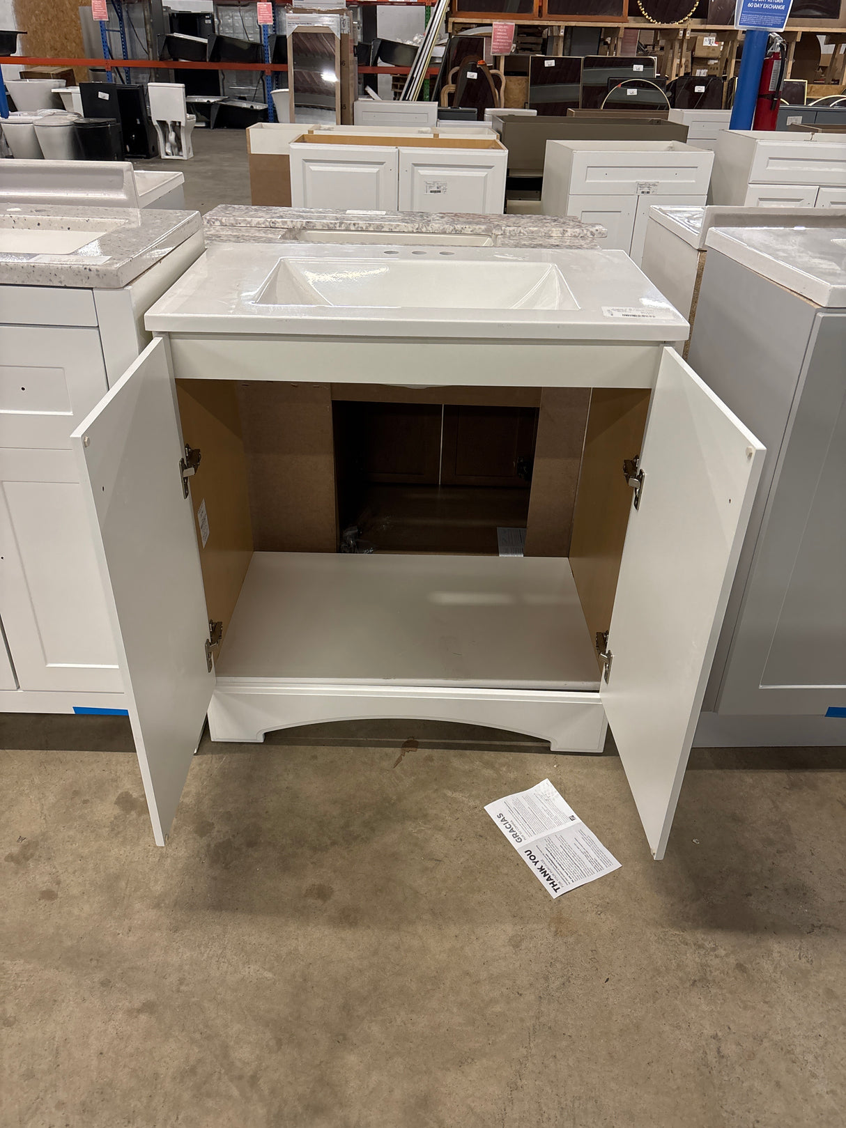 31 in. W x 19 in. D x 35 in. H Single Sink Freestanding Bath Vanity in White with White Cultured Marble Top