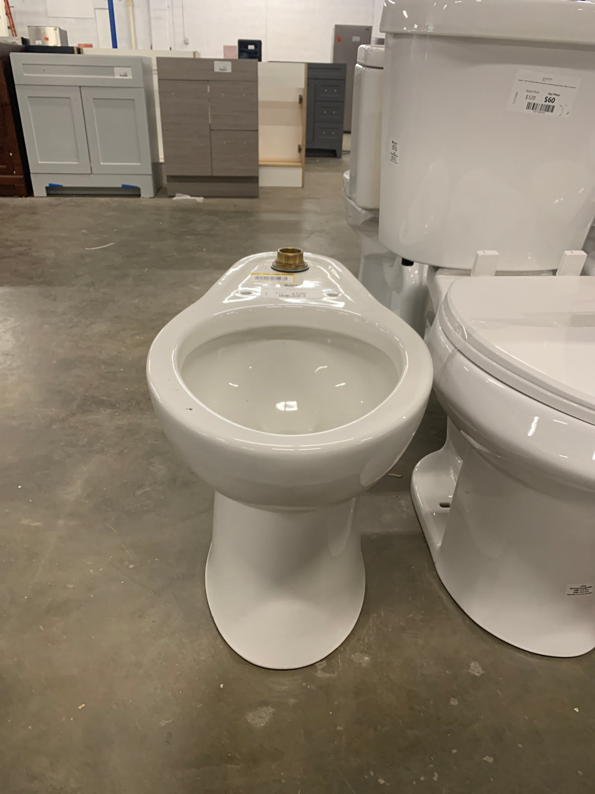 Madera 1-Piece 1.28 GPF Single Flush Elongated Toilet in White