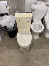 Load image into Gallery viewer, Classe 1-Piece 1.28 GPF Single Flush Elongated Toilet with Front Flush Handle in Bisque Seat Included
