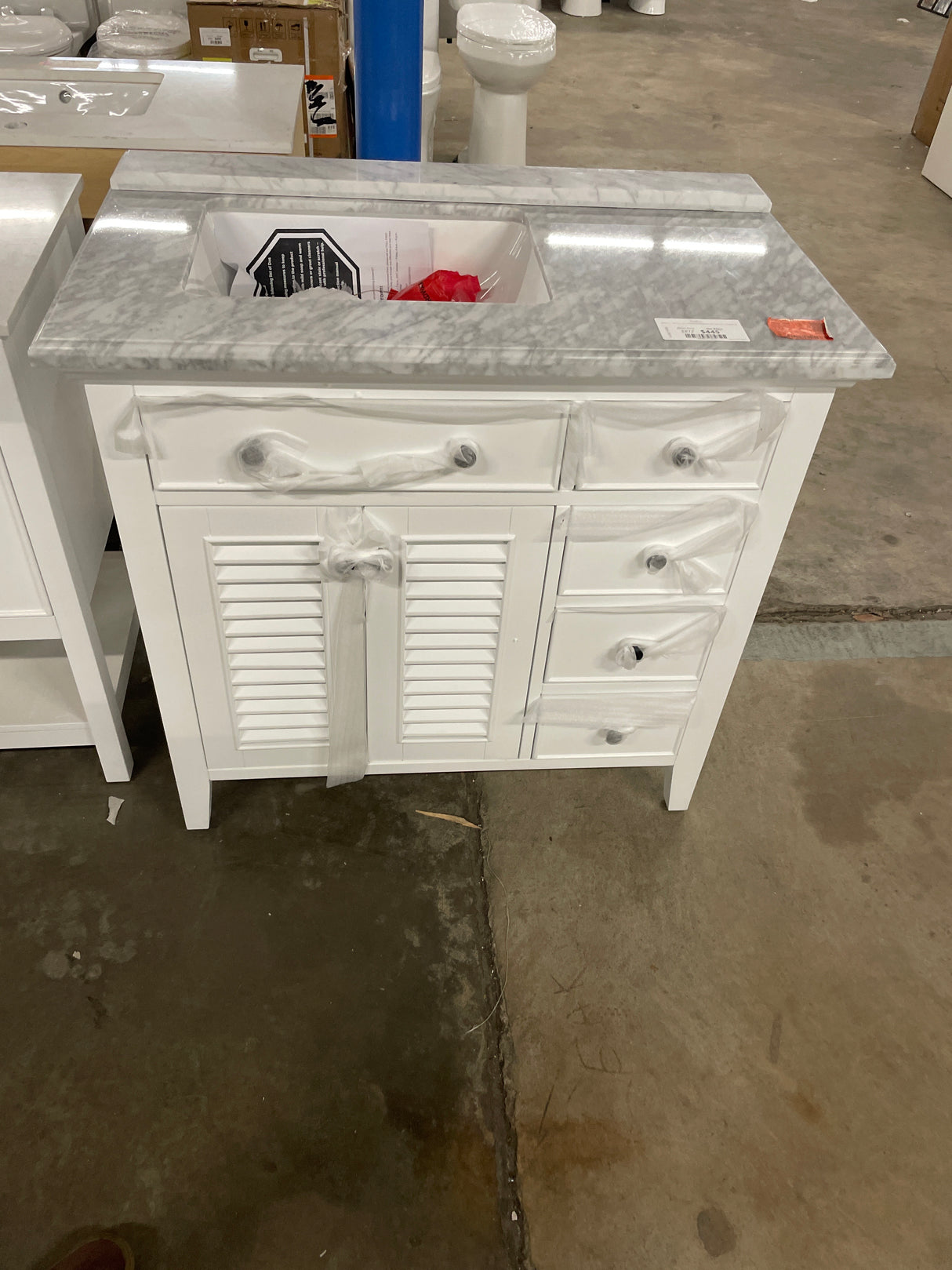 Fallworth 37 in. W x 22 in. D x 35 in. H Single Sink Freestanding Bath Vanity in White with Carrara Marble Top