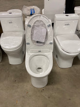 Load image into Gallery viewer, 1-piece 1.1 GPF Ivy 10 in. Rough-In Dual Flush Elongated Toilet in White Seat Included

