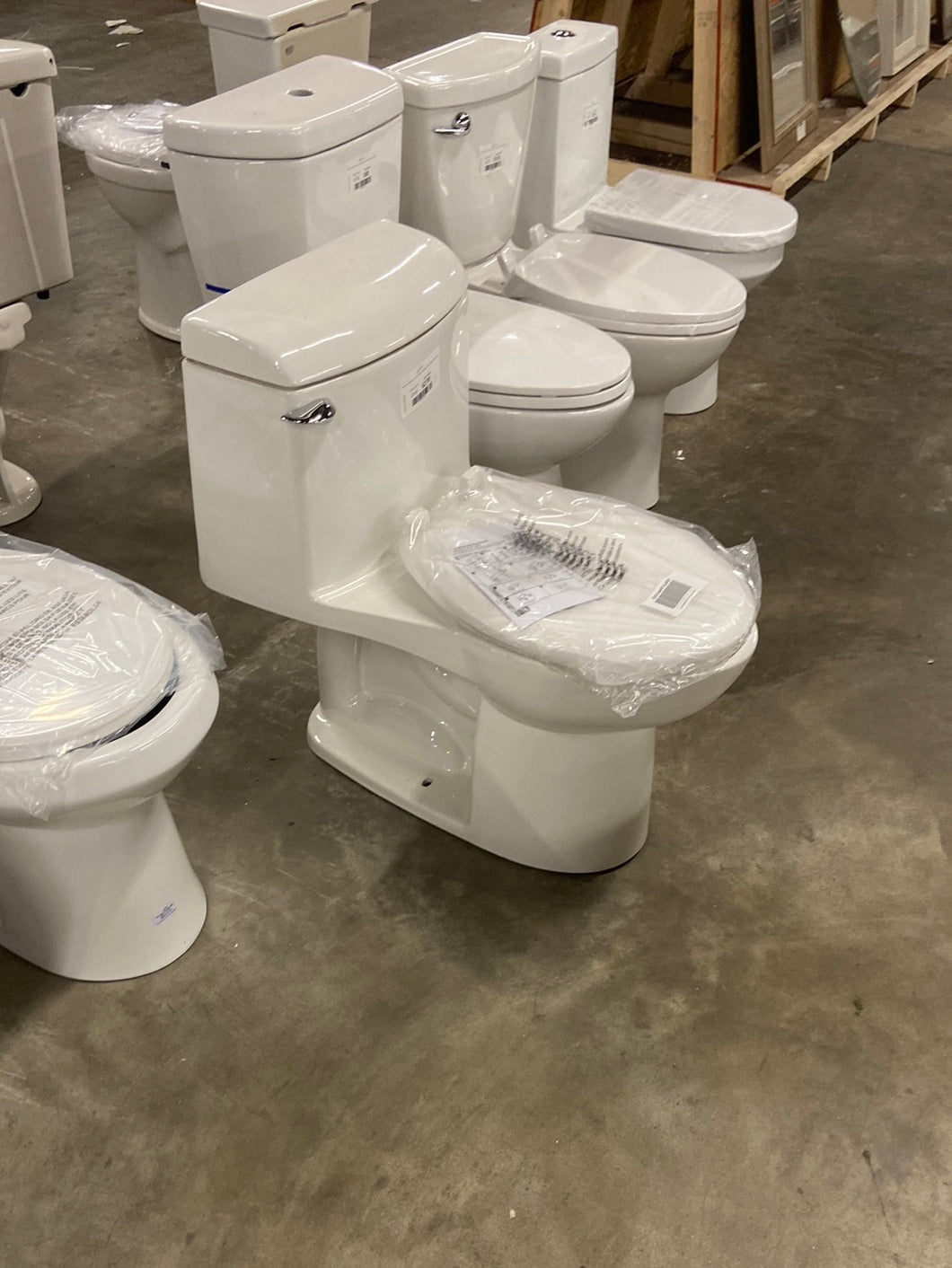 Champion 4 Tall Height 1-Piece 1.6 GPF Single Flush Elongated Toilet in White, Seat Included