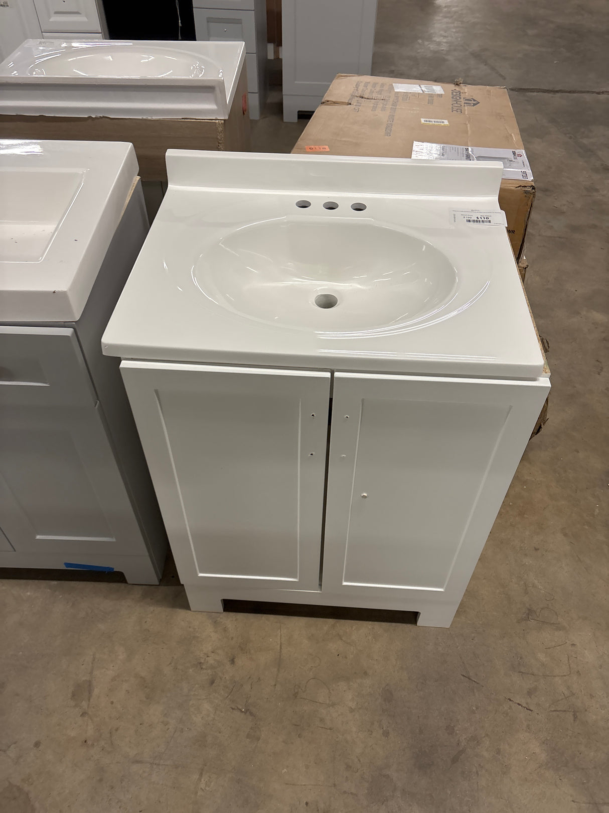 Oakley 25 in. Single Sink White Bath Vanity with White Cultured Marble Top (Assembled)