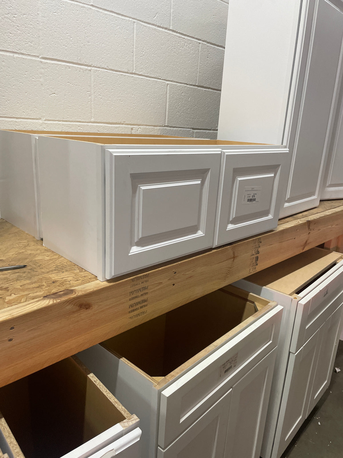 Hampton Satin White Raised Panel Stock Assembled Wall Bridge Kitchen Cabinet (30 in. x 12 in. x 12 in.)