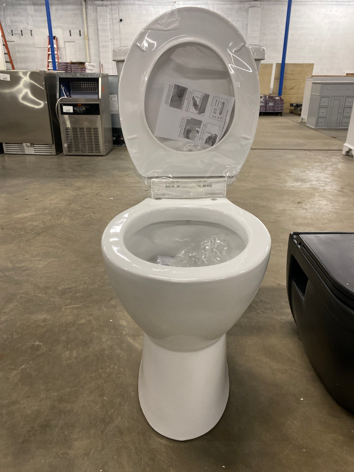19 in. Rear Discharge Toilet 2-Piece 1.0/1.6 GPF Dual Flush Round Toilet in White, Seat Included