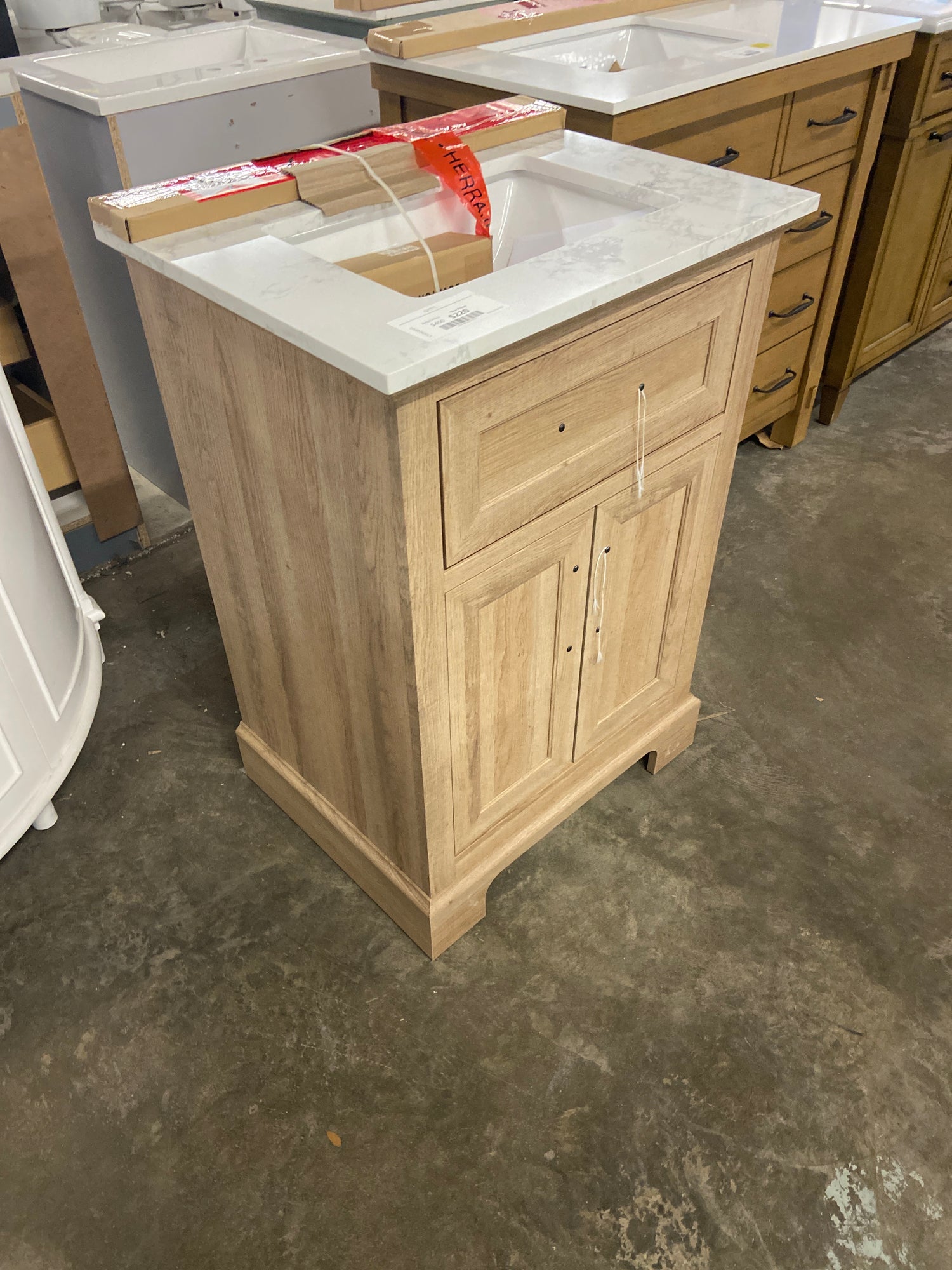 Doveton 24 in. W x 19 in. D x 34.5 in. H Single Sink Bath Vanity in Weathered Tan with White Engineered Marble Top