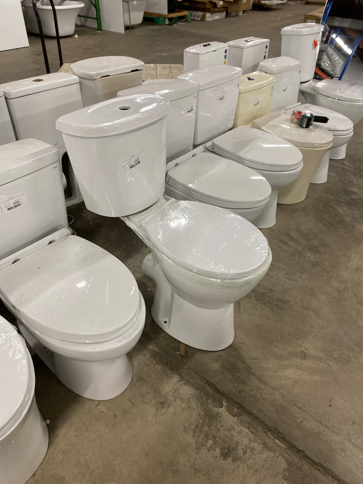 19 in. Rear Discharge Toilet 2-Piece 1.0/1.6 GPF Dual Flush Round Toilet in White, Seat Included