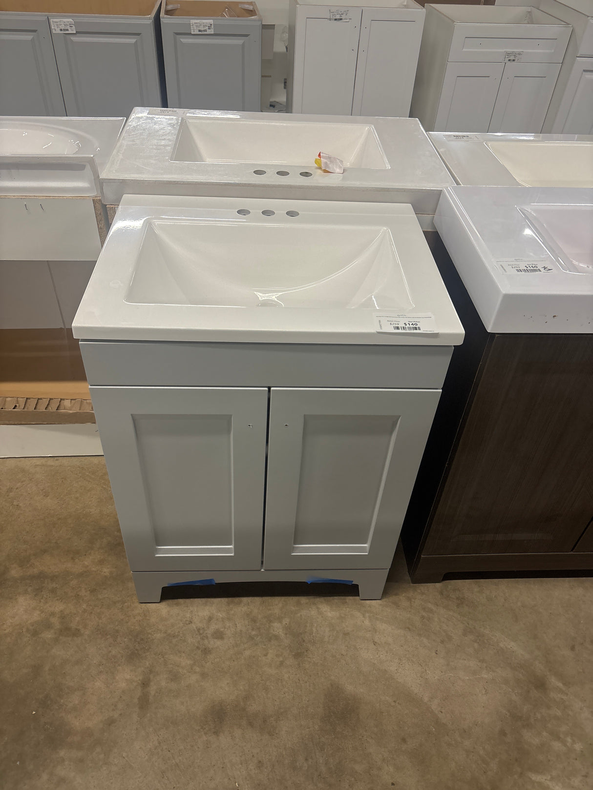 Delridge 25 in. Single Sink Pearl Gray Bath Vanity with White Cultured Marble Top (Assembled)