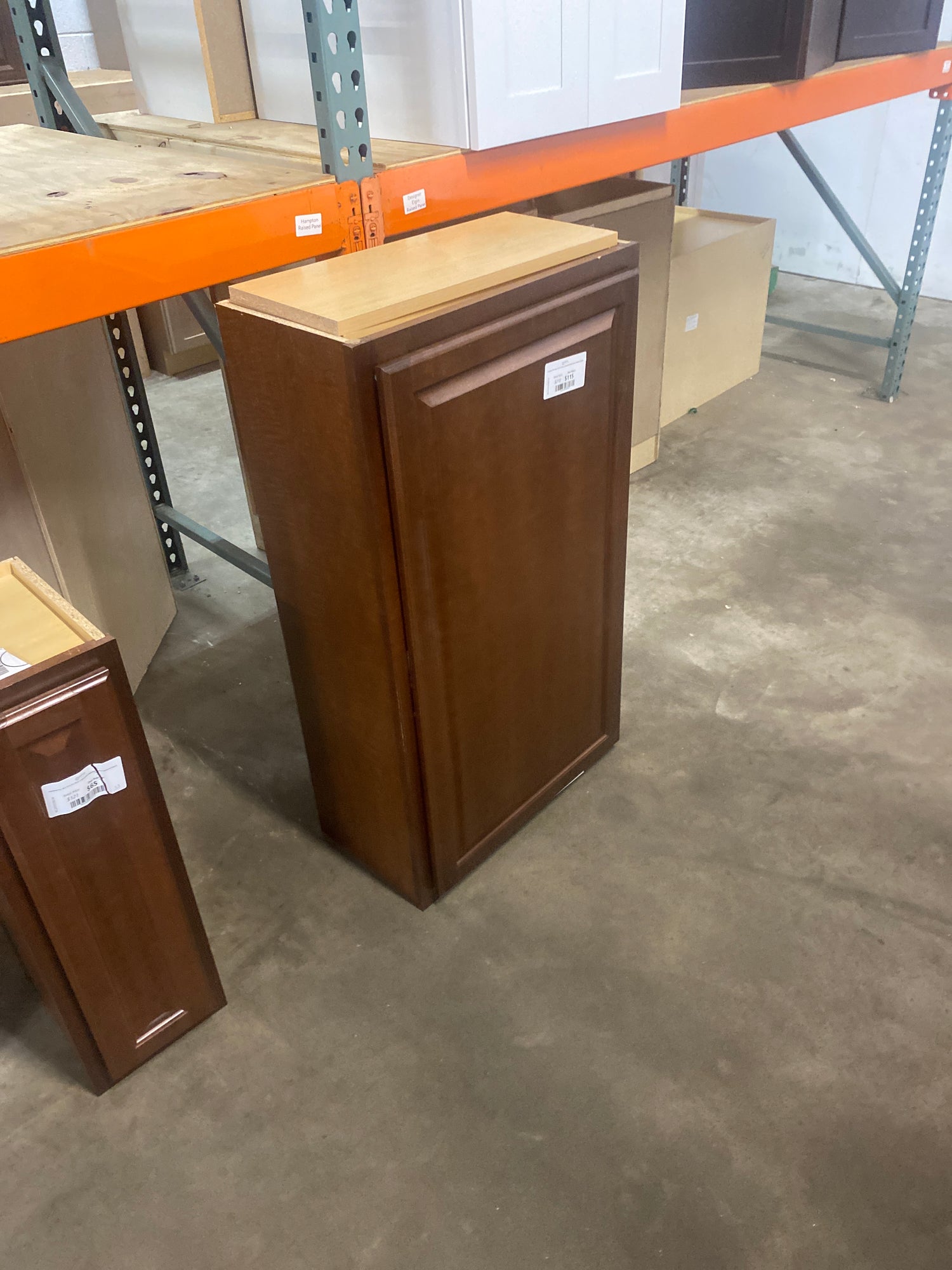 Hampton 24 in. W x 12 in. D x 42 in. H Assembled Wall Kitchen Cabinet in Cognac
