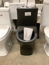 Load image into Gallery viewer, Sublime II 1-Piece 1.1/1.6 GPF Toilet Dual Flush Round Toilet in Matte Black Seat Not Included
