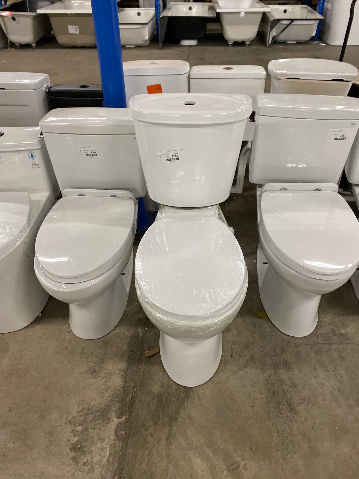 19 in. Rear Discharge Toilet 2-Piece 1.0/1.6 GPF Dual Flush Round Toilet in White, Seat Included