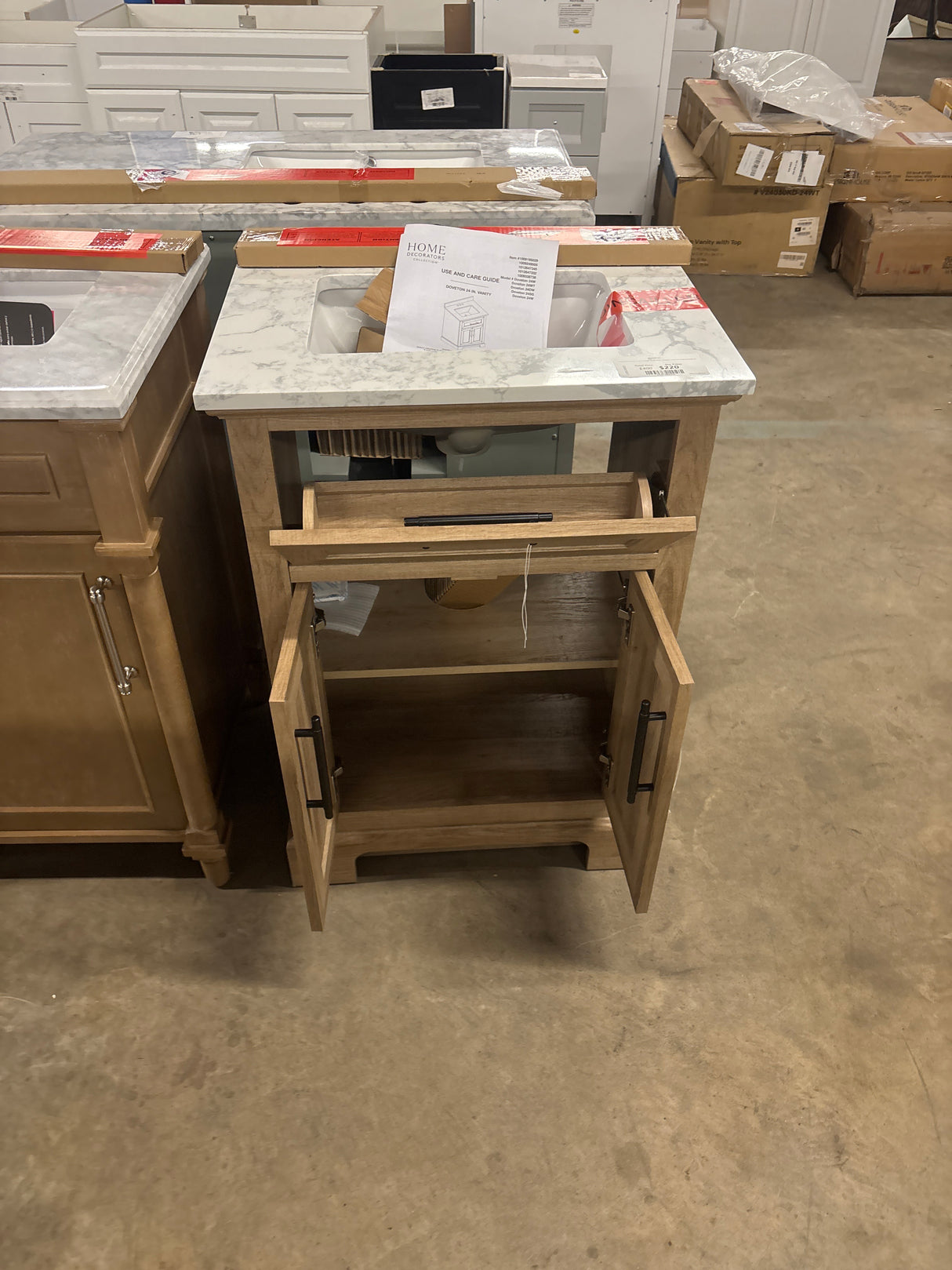 Doveton 24 in. W x 19 in. D x 34.5 in. H Single Sink Bath Vanity in Weathered Tan with White Engineered Marble Top