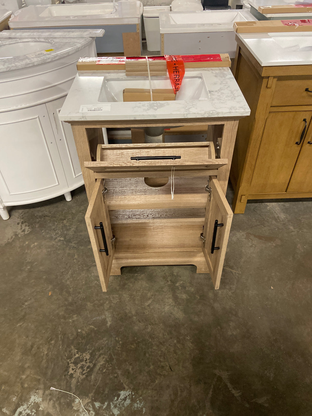 Doveton 24 in. W x 19 in. D x 34.5 in. H Single Sink Bath Vanity in Weathered Tan with White Engineered Marble Top
