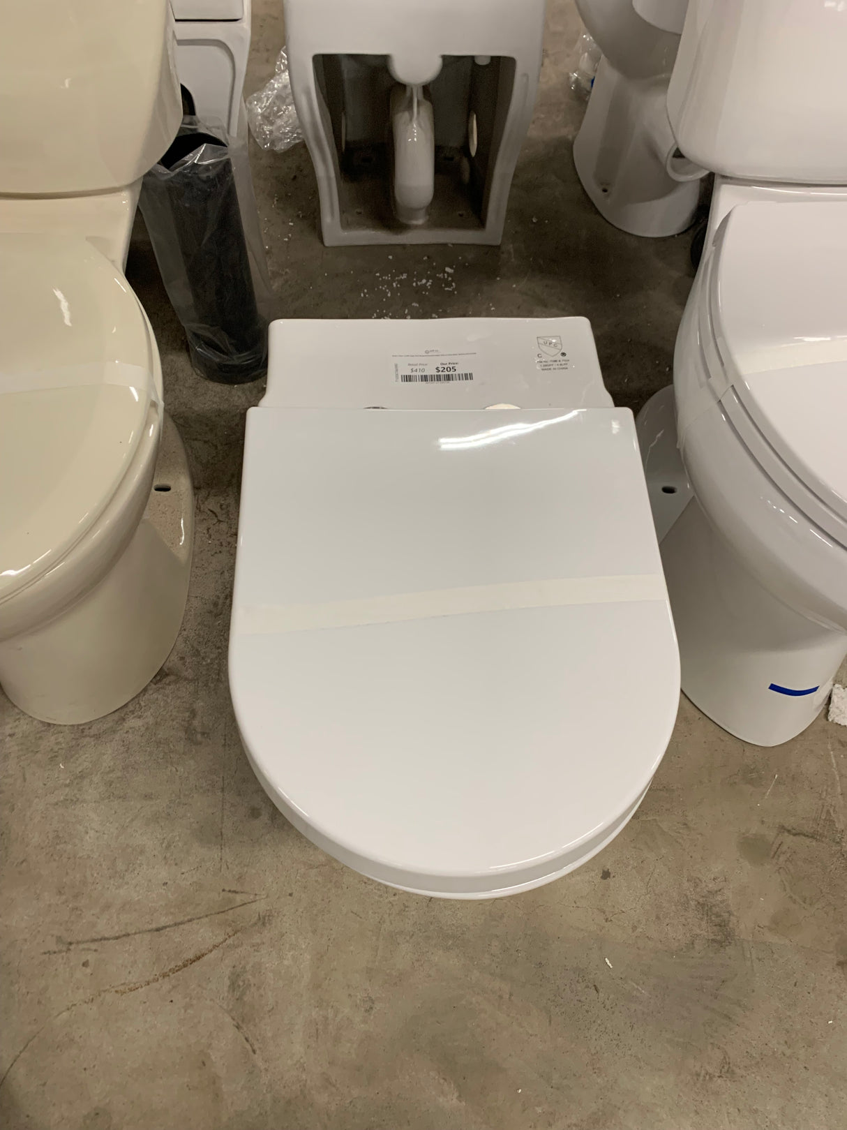 Single Flush Elongated Standard Height Toilet in Cotton White, SoftClose Seat Included