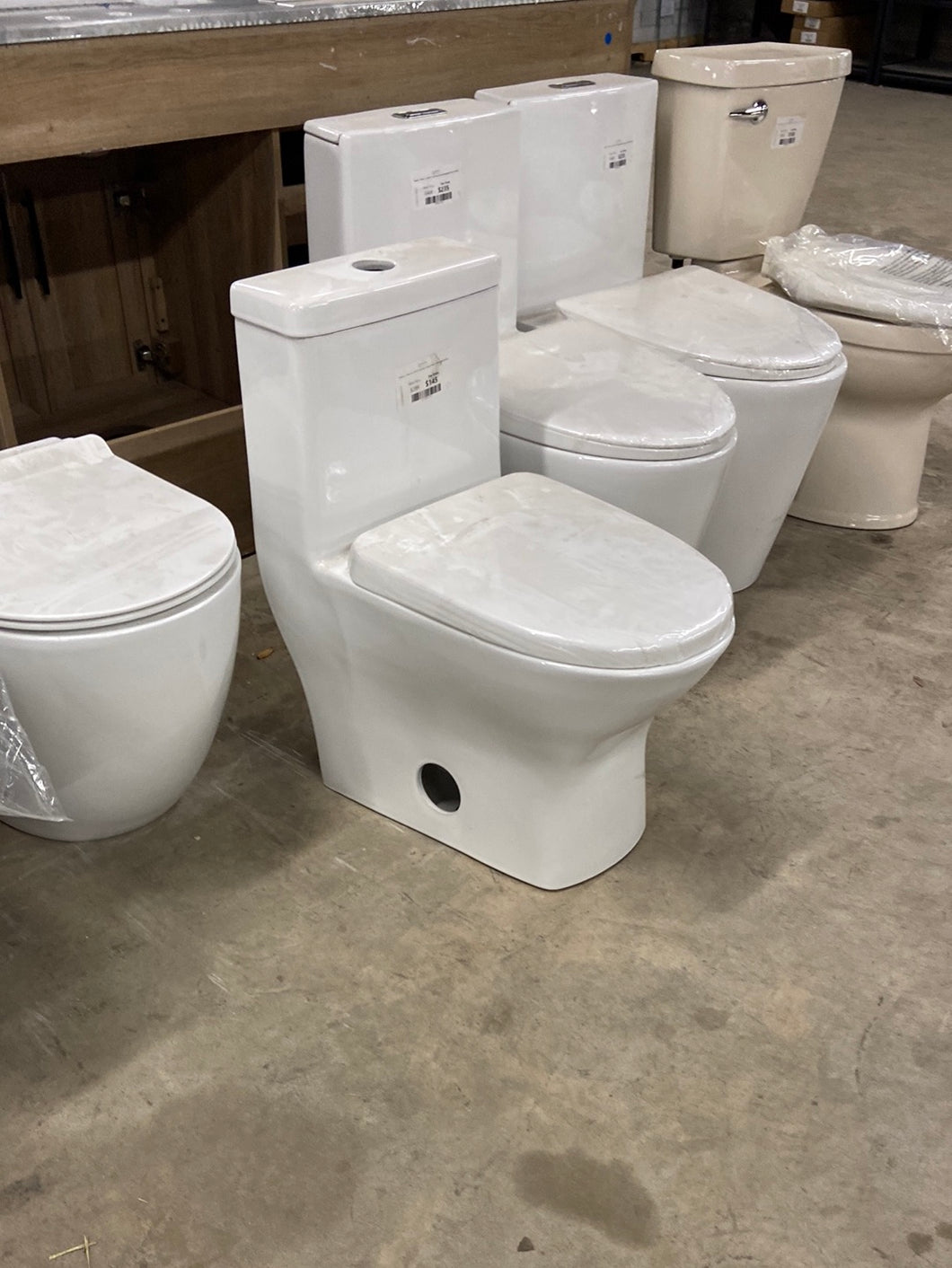 Sublime II 1-Piece 0.8/1.28 GPF Dual Flush Compact Toilet in White, Seat Included