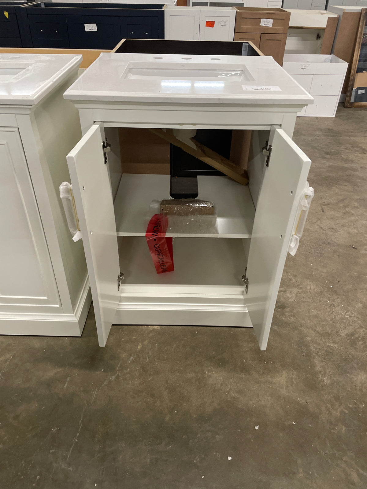 Ravenscroft 25 in. Single Sink Freestanding Bath Vanity in White Swan w/ Carrara White Engineered Stone Top (Assembled)