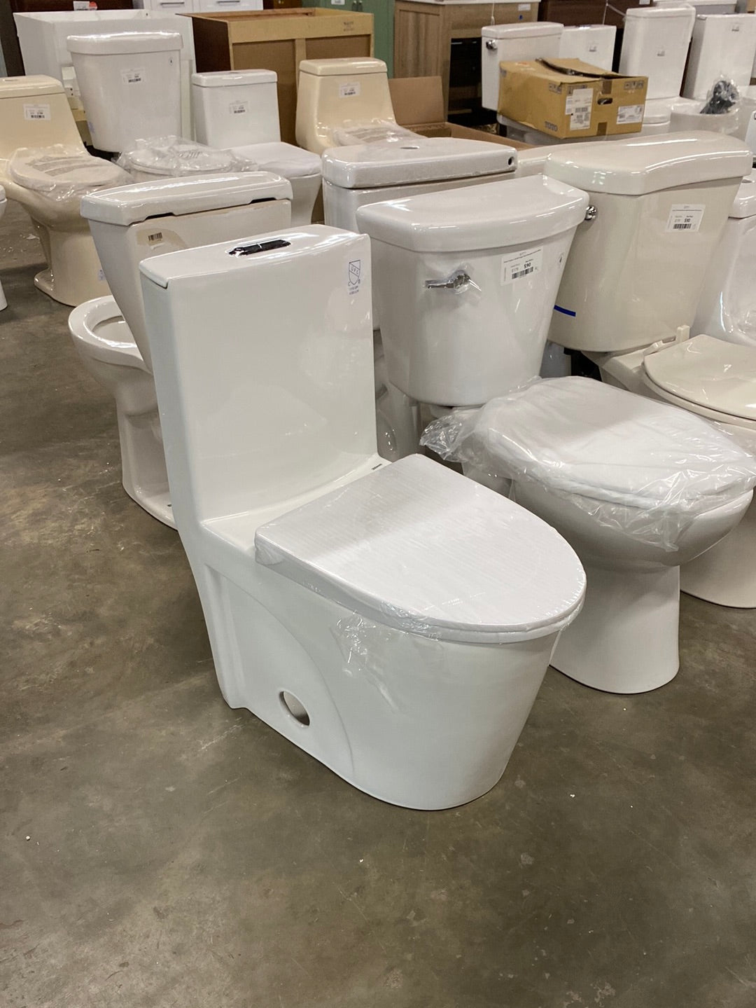 Ultraluxe 12 in. Rough-In 1-piece 1/1.6 GPF Dual Flush Elongated Toilet in White, Seat Included
