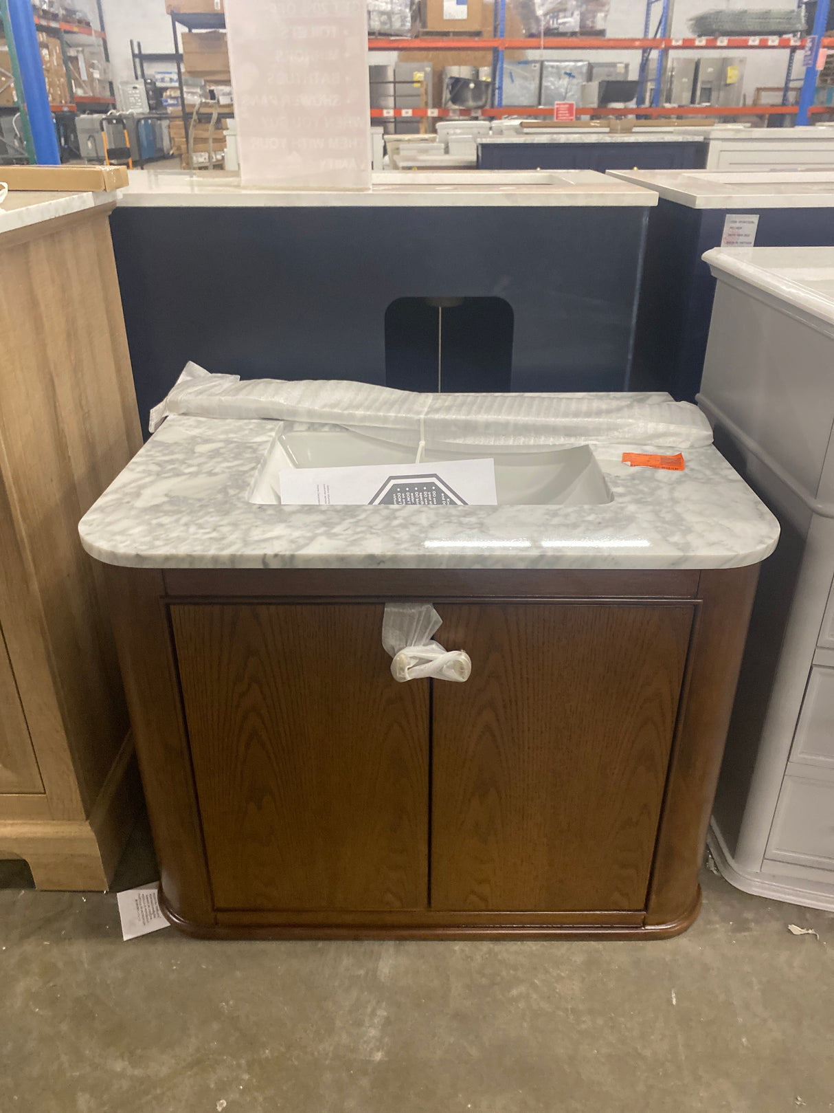 Collette 30 in W x 22 in D x 35 in H Single Sink Bath Vanity in Cinnamon Oak With White Carrara Marble Top