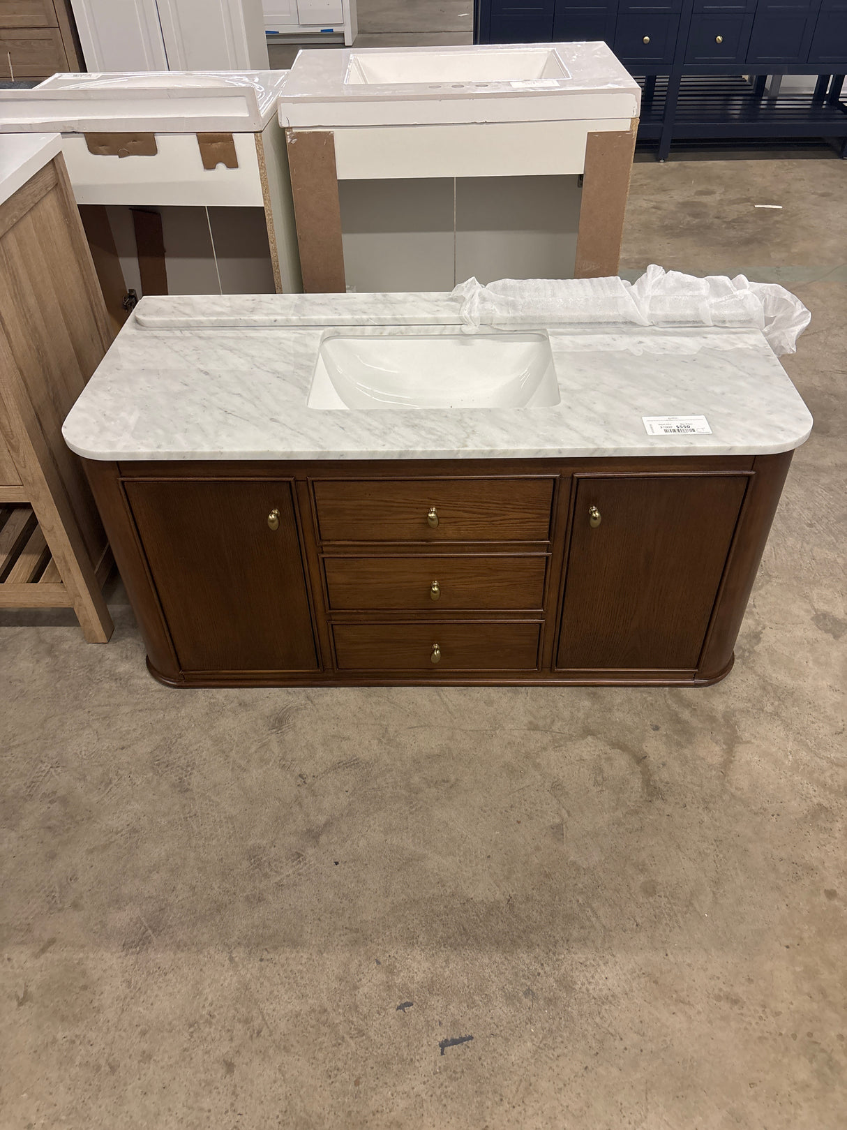 Collette 48 in W x 22 in D x 35 in H Single Sink Bath Vanity in Cinnamon Oak With White Carrara Marble Top
