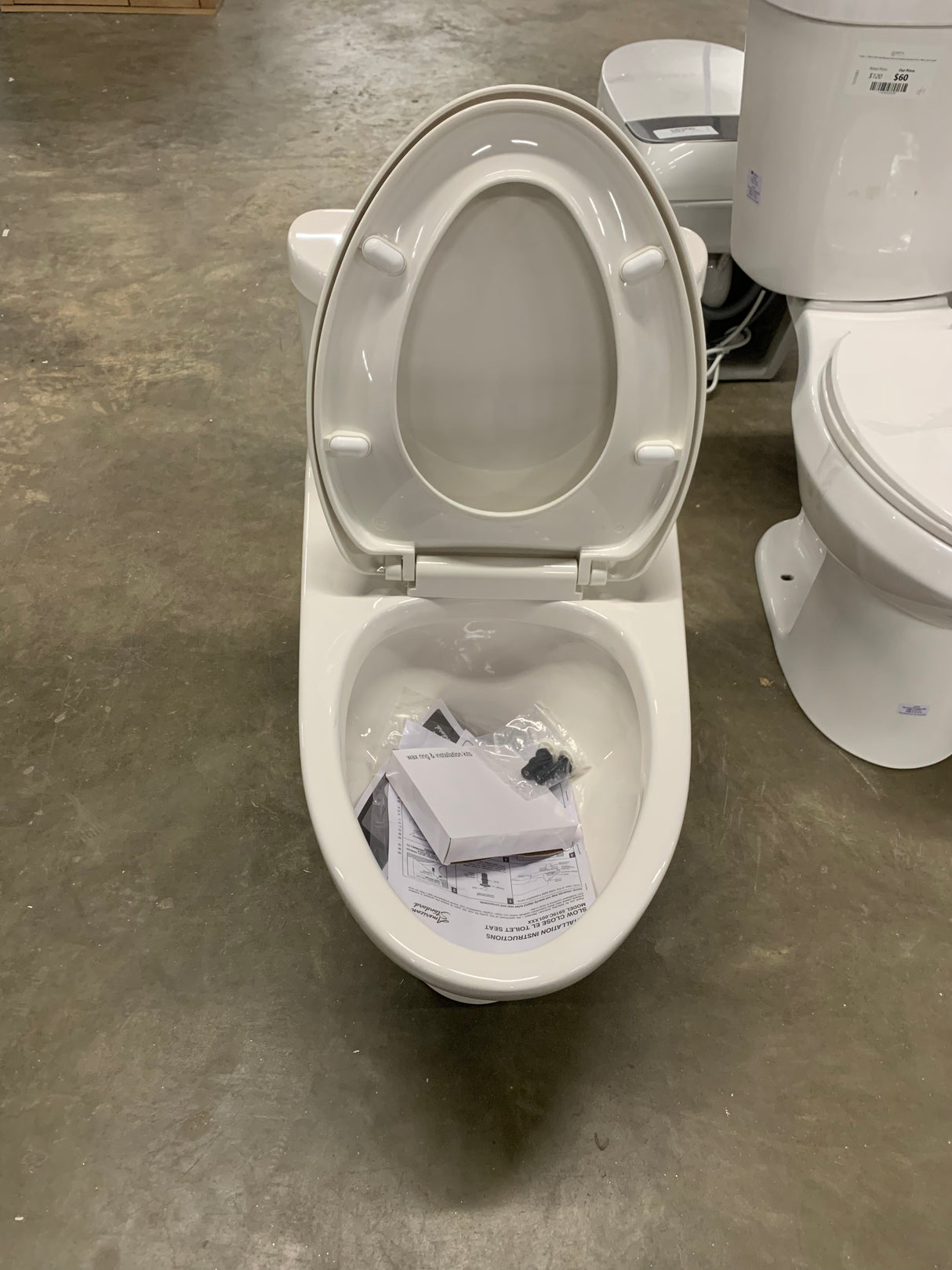 Tofino Complete 1-Piece 1.1 GPF Dual Flush Elongated Toilet in White with Slow Close Seat