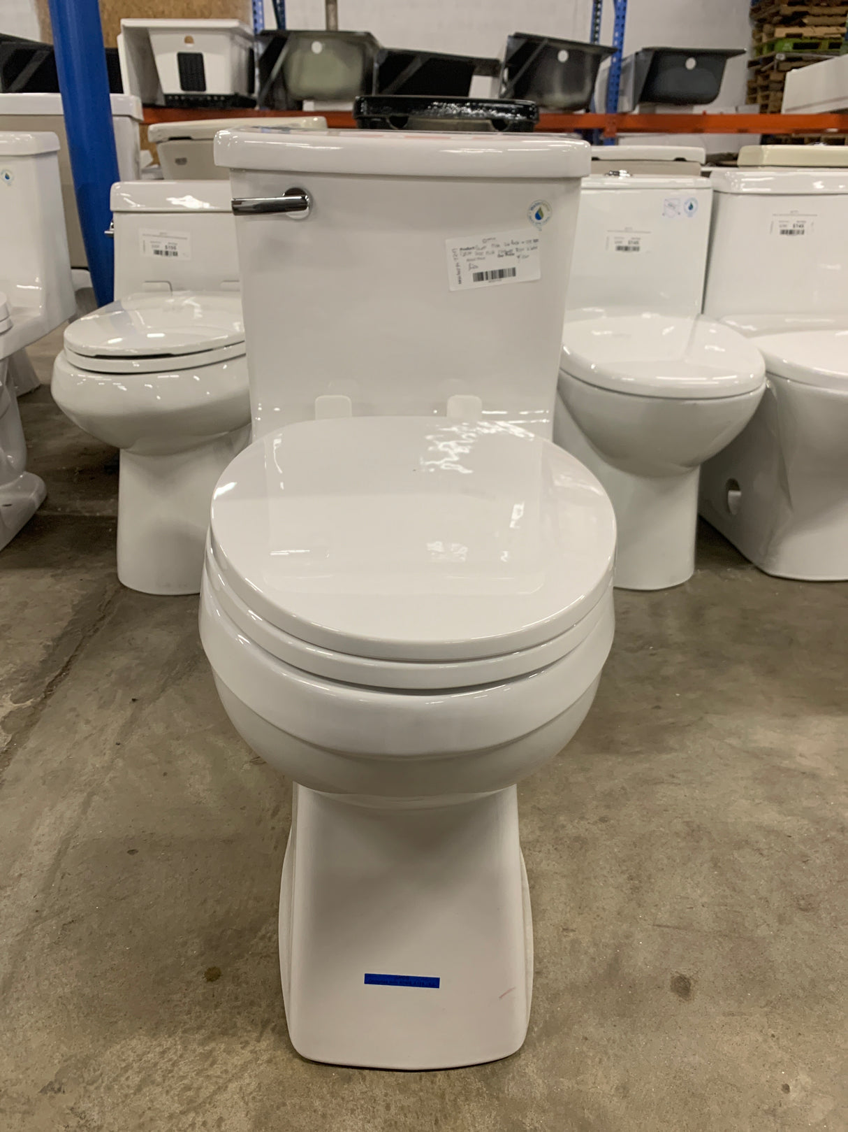 Power Flush 1-piece 1.28 GPF Single-Flush Elongated Toilet in White Seat Included