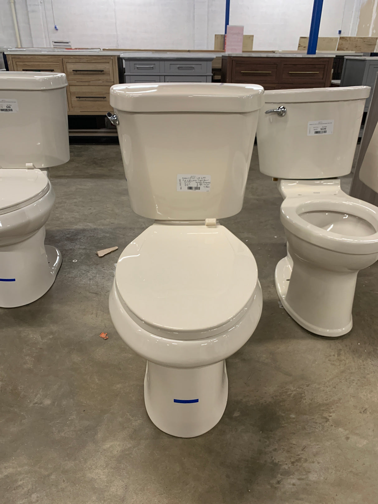 2-piece 1.28 GPF High Efficiency Single Flush Elongated Toilet in Bone