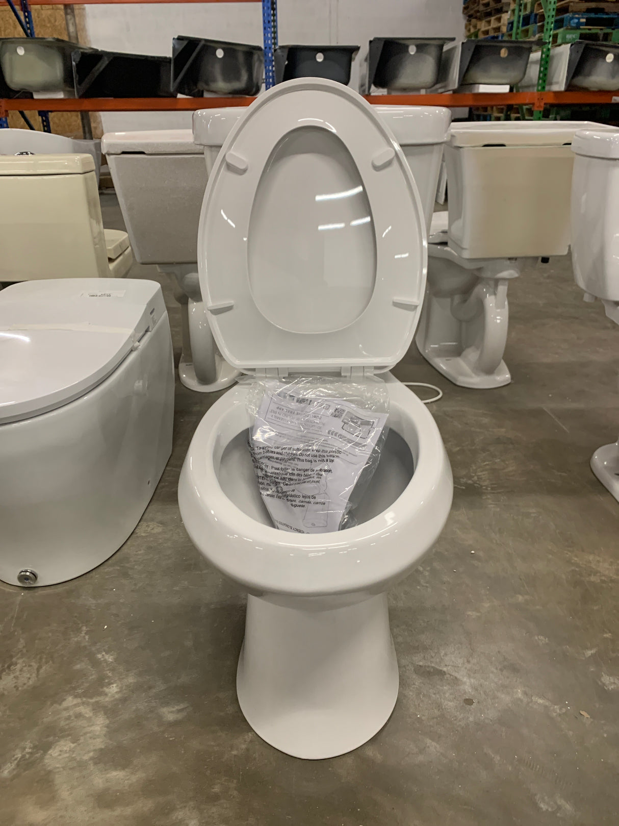 2-piece 1.1 GPF/1.6 GPF High Efficiency Dual Flush Complete Elongated Toilet in White, Seat Included