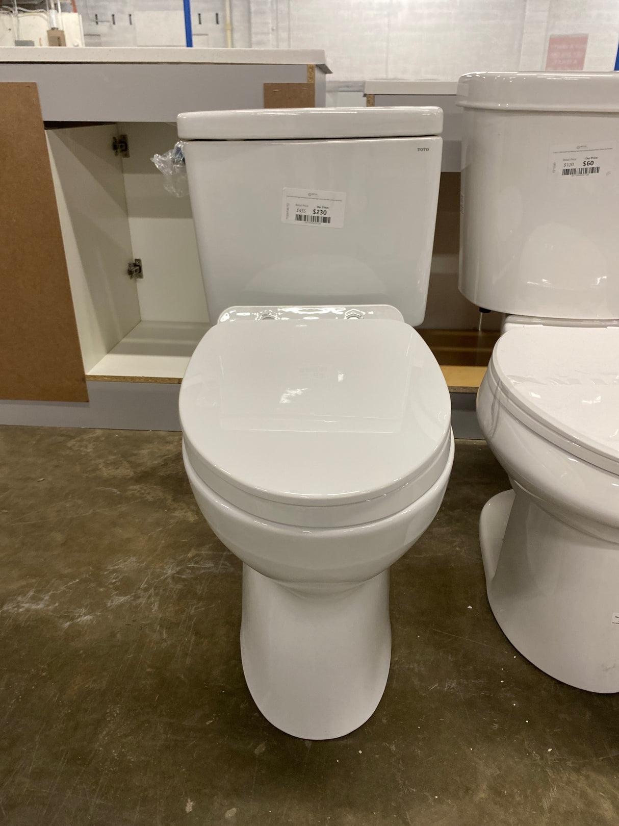 Drake 2-Piece 1.6 GPF Single Flush Elongated ADA Comfort Height Toilet in Cotton White, SoftClose Seat Included