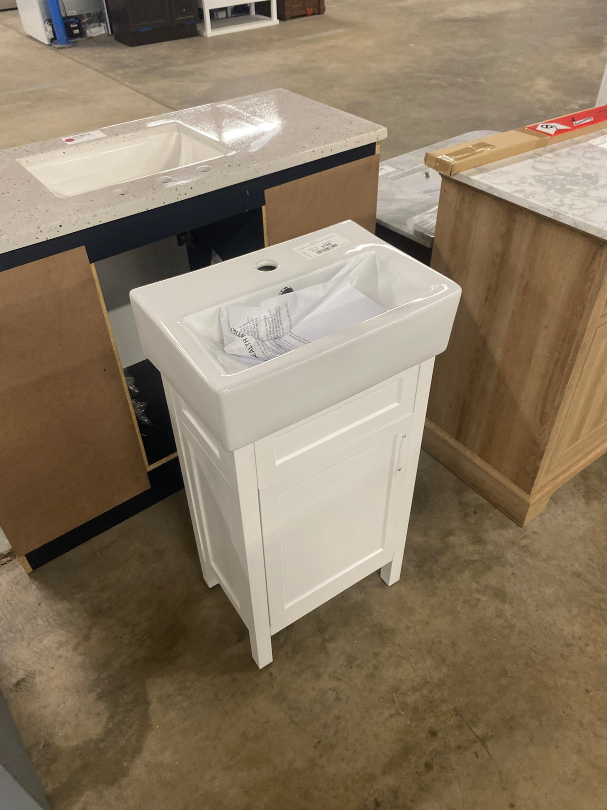 Arvesen 18 in. W x 12 in. D Vanity in White with Ceramic Vanity Top in White with White Sink
