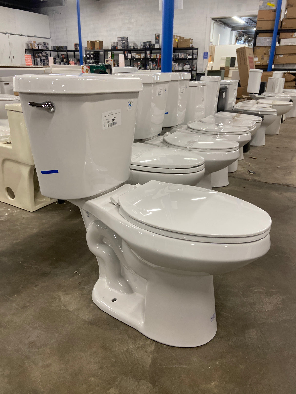 10 in. Rough-In 2-piece 1.28 GPF Single Flush Elongated Toilet in White, Seat Included