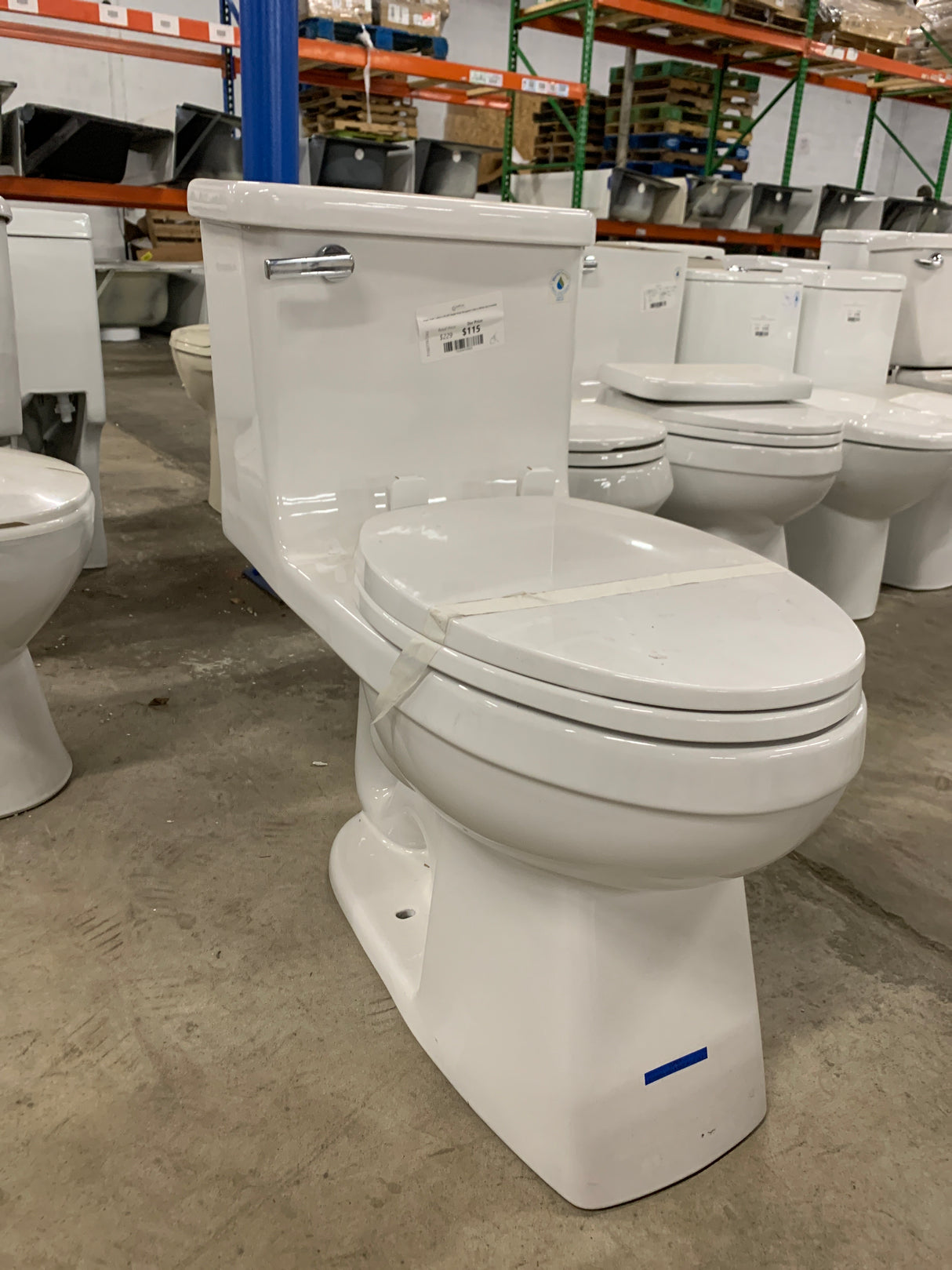 Power Flush 1-piece 1.28 GPF Single-Flush Elongated Toilet in White Seat Included