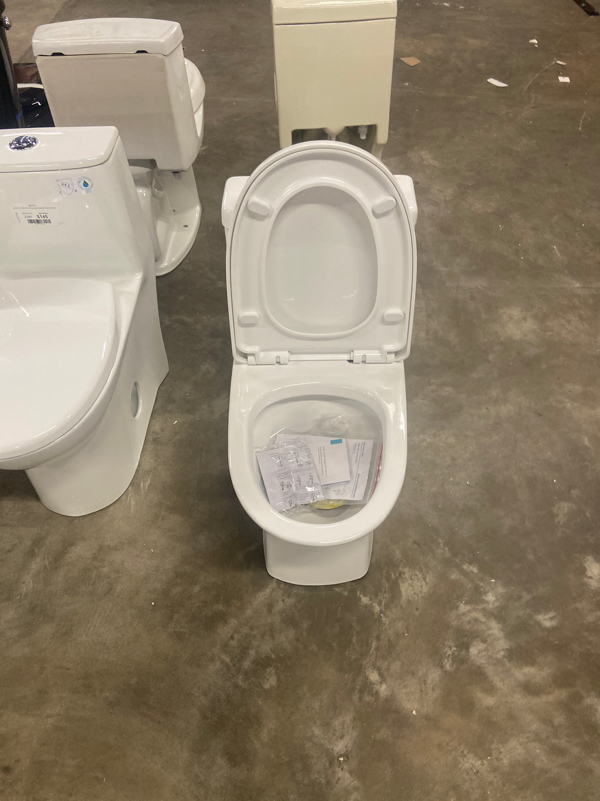 Sublime II 1-Piece 0.8/1.28 GPF Dual Flush Compact Toilet in White, Seat Included